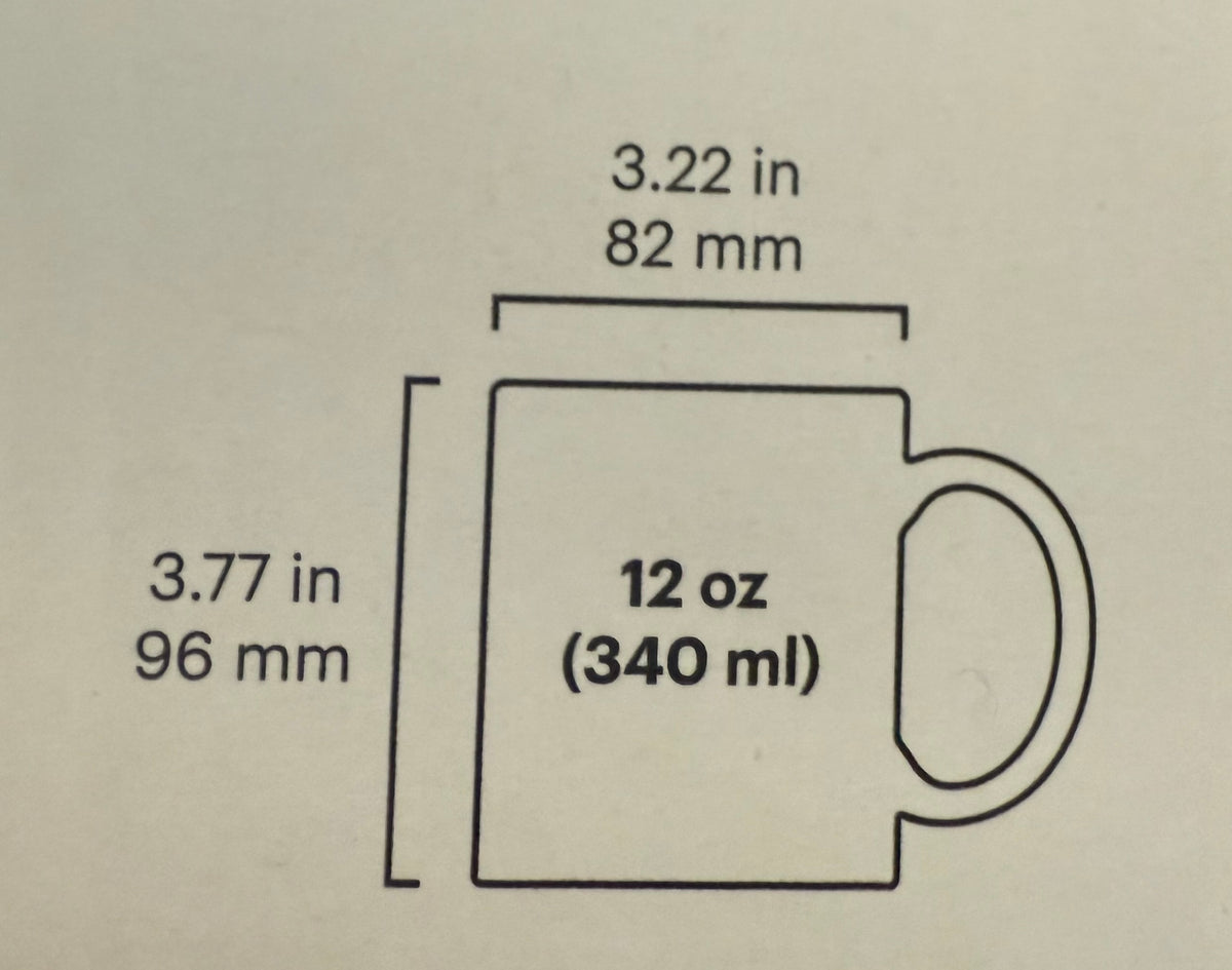 A simple line drawing of a mug with printed dimensions and capacity text on a plain light background. The mug is labeled 12 oz (340 ml). Roxzell