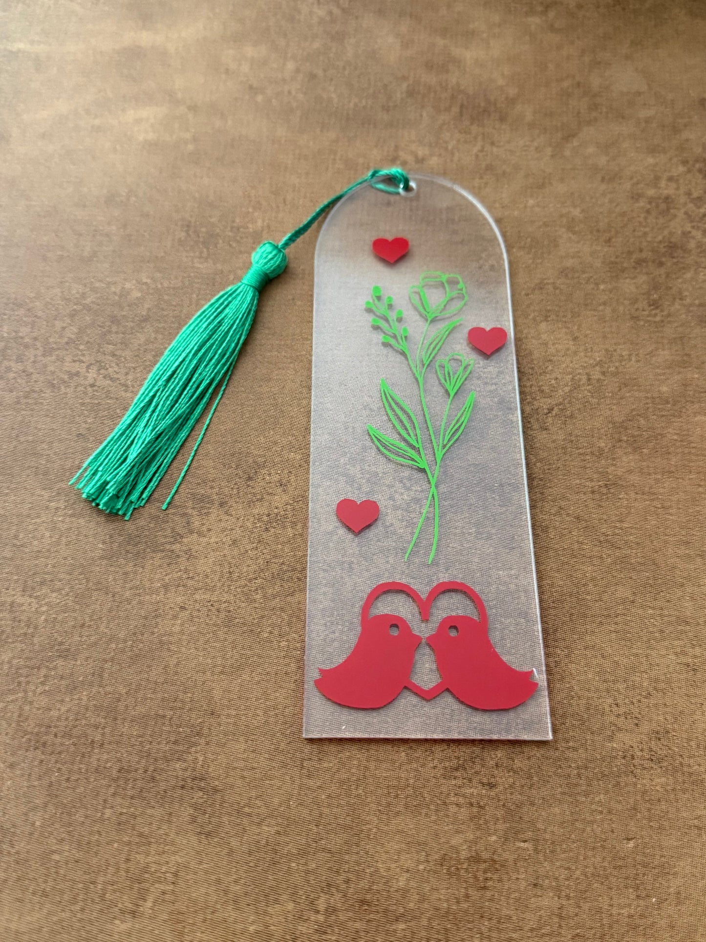Acrylic bookmark with green flowers, red love birds, and a green tassel Roxzell
