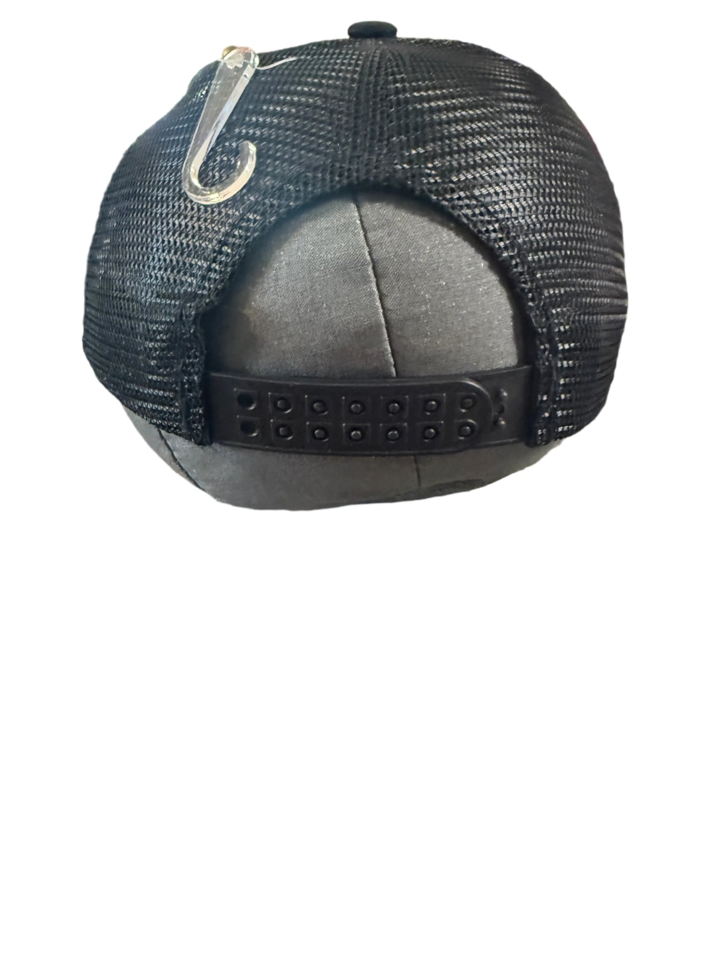 Black and white baseball cap with bejeweled "Blessed" design on the front.