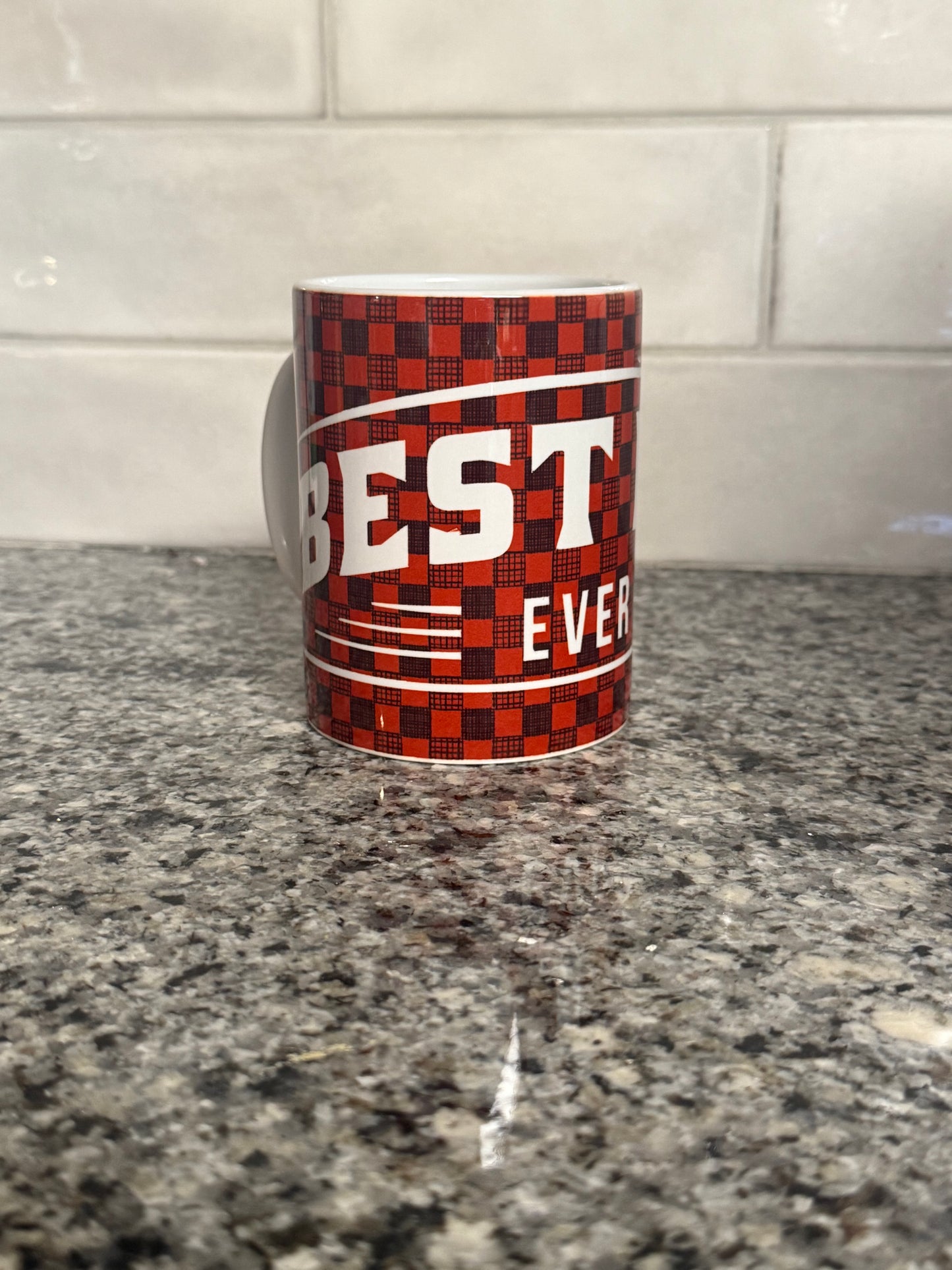 Red and Black checkered coffee mug with 'BEST DAD EVER' design.