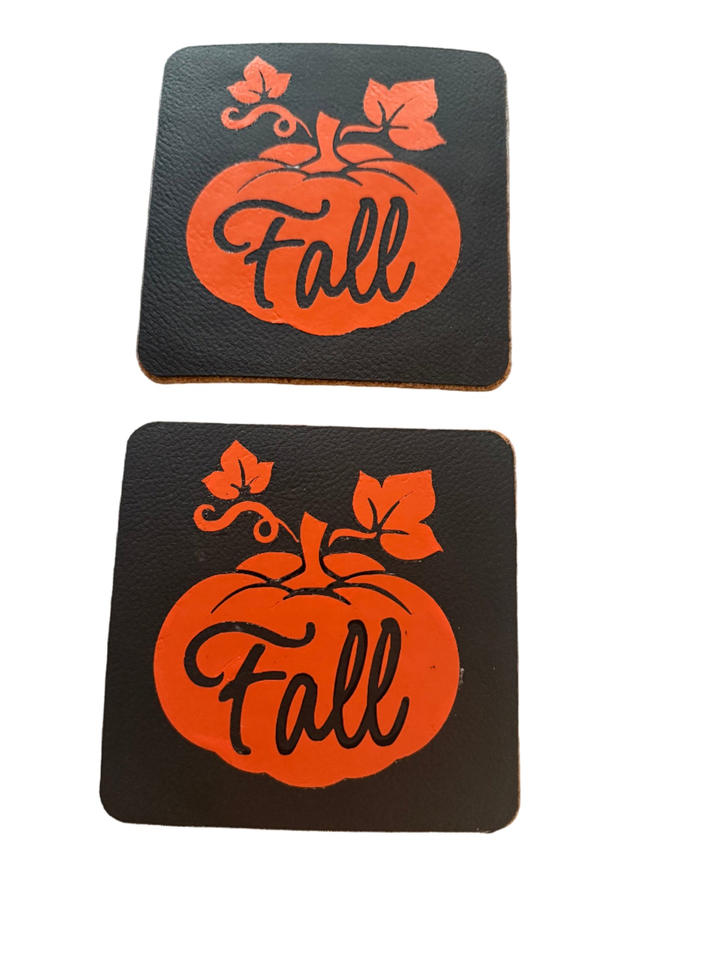 Square black leather coaster with the word Fall written in an orange pumpkin, Roxzell