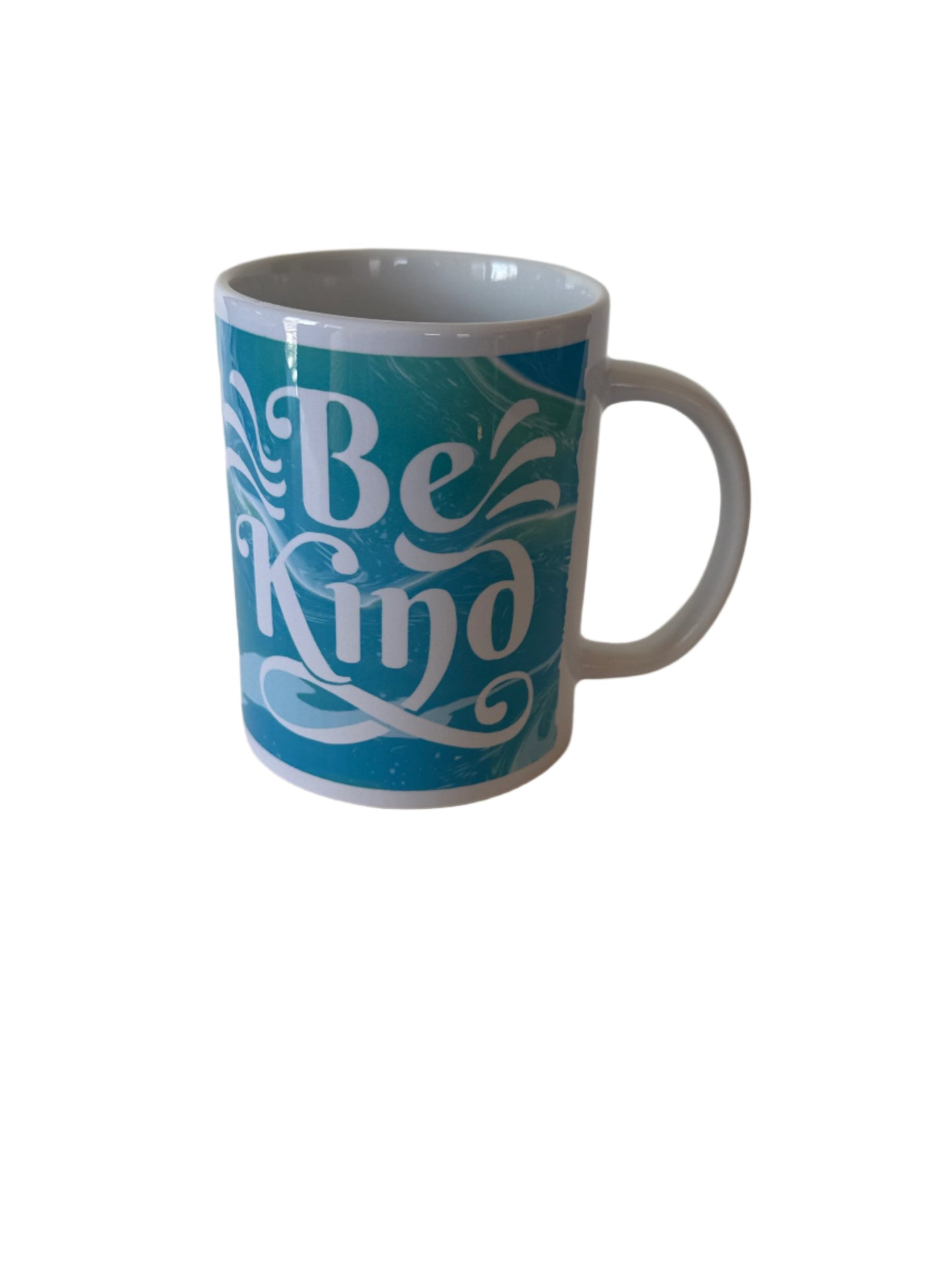 "Be Kind' ceramic coffee mug in blue and green with white handle Roxzell