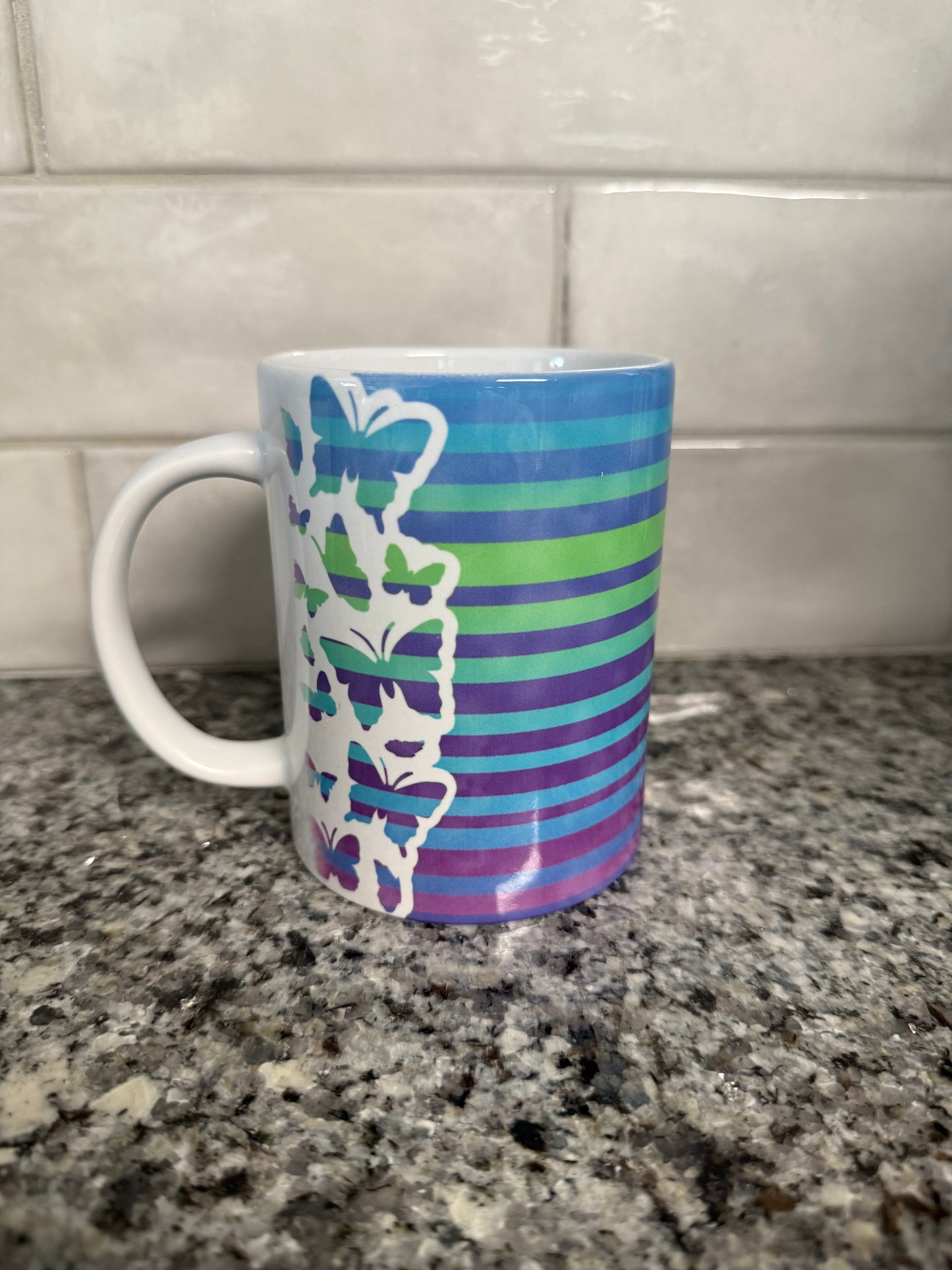 butterfly coffee mug with blue green and purple stripes Roxzell