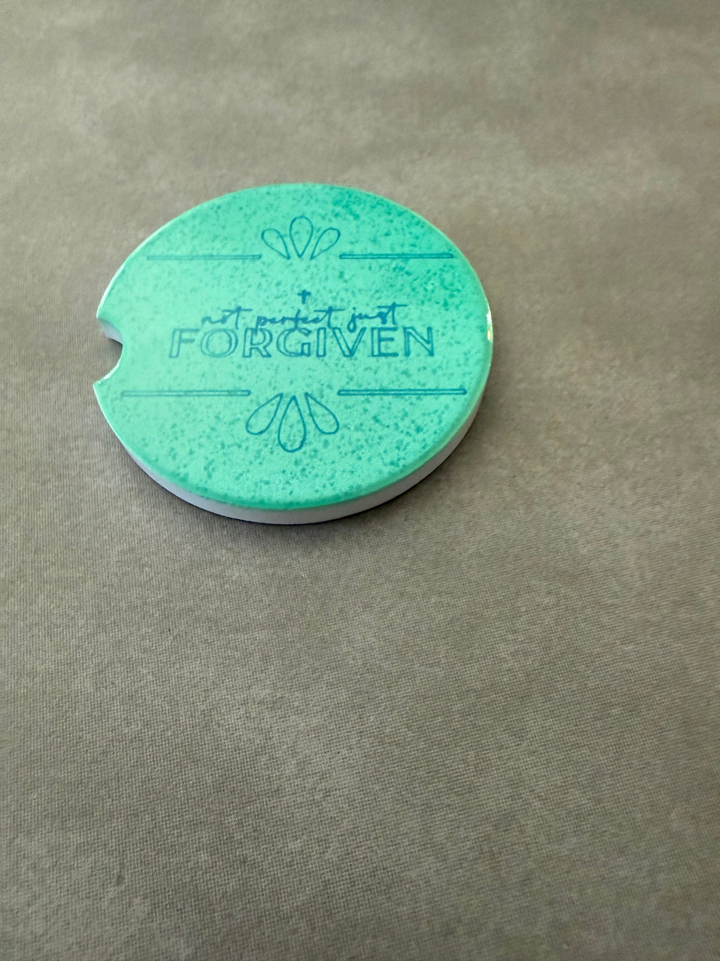 Green car coaster with "Not Perfect Just Forgiven" design Roxzell