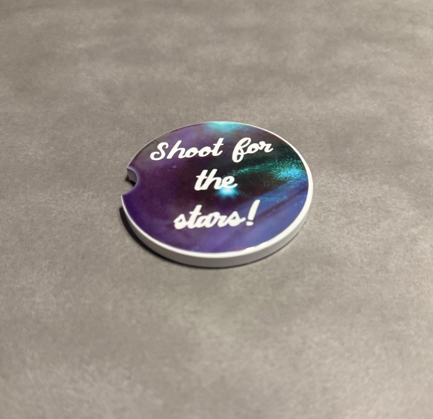 "Shoot for the Stars" car coaster with purple, black and green galaxy background Roxzell