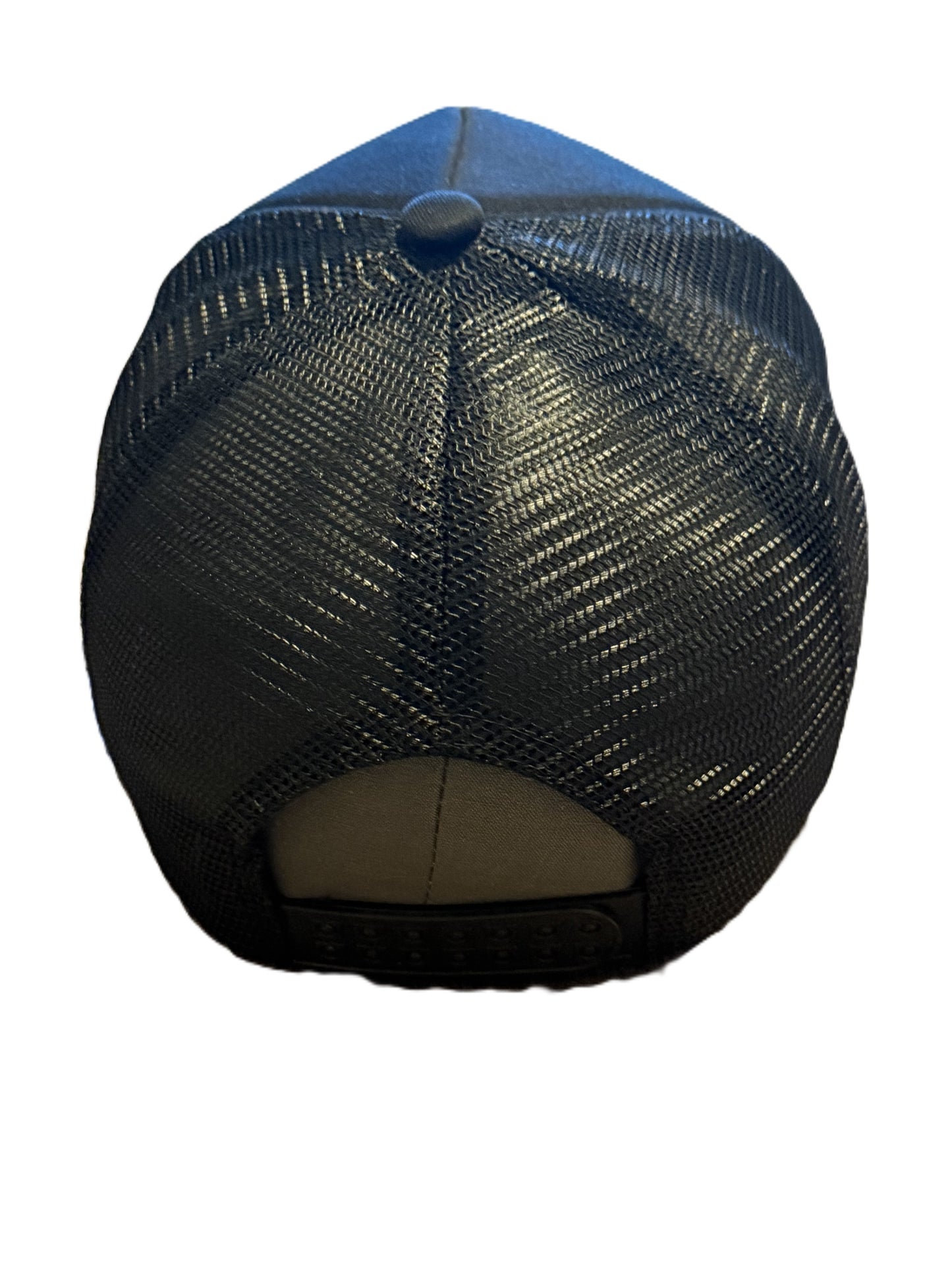 Rear view of black Vintage Soul trucker cap with a black mesh back and a dark button on the crown, on a white background. Roxzell