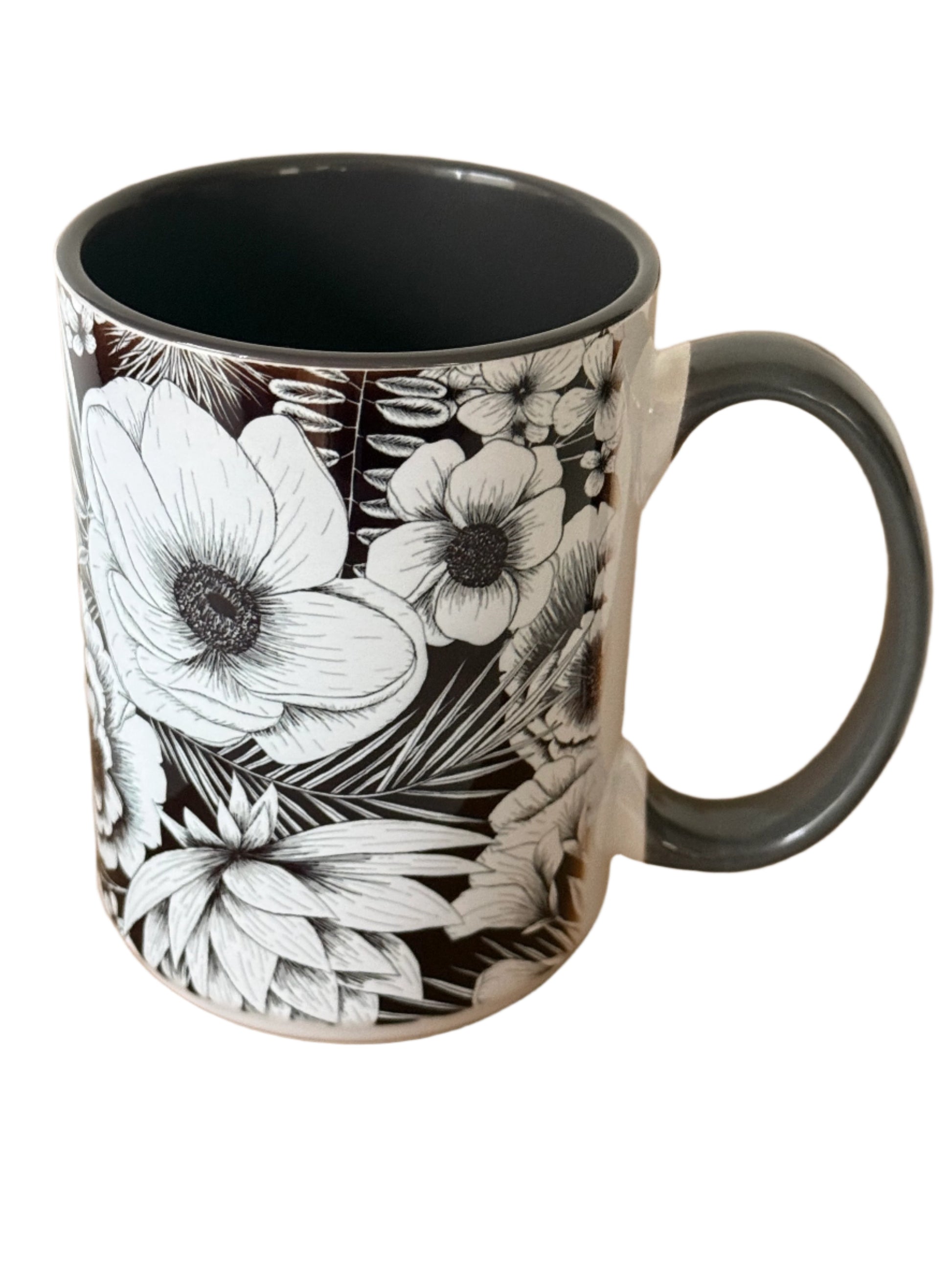 Beautiful 15 oz mug with black and white botanical flower.  Mug has a gray interior and gray handle.