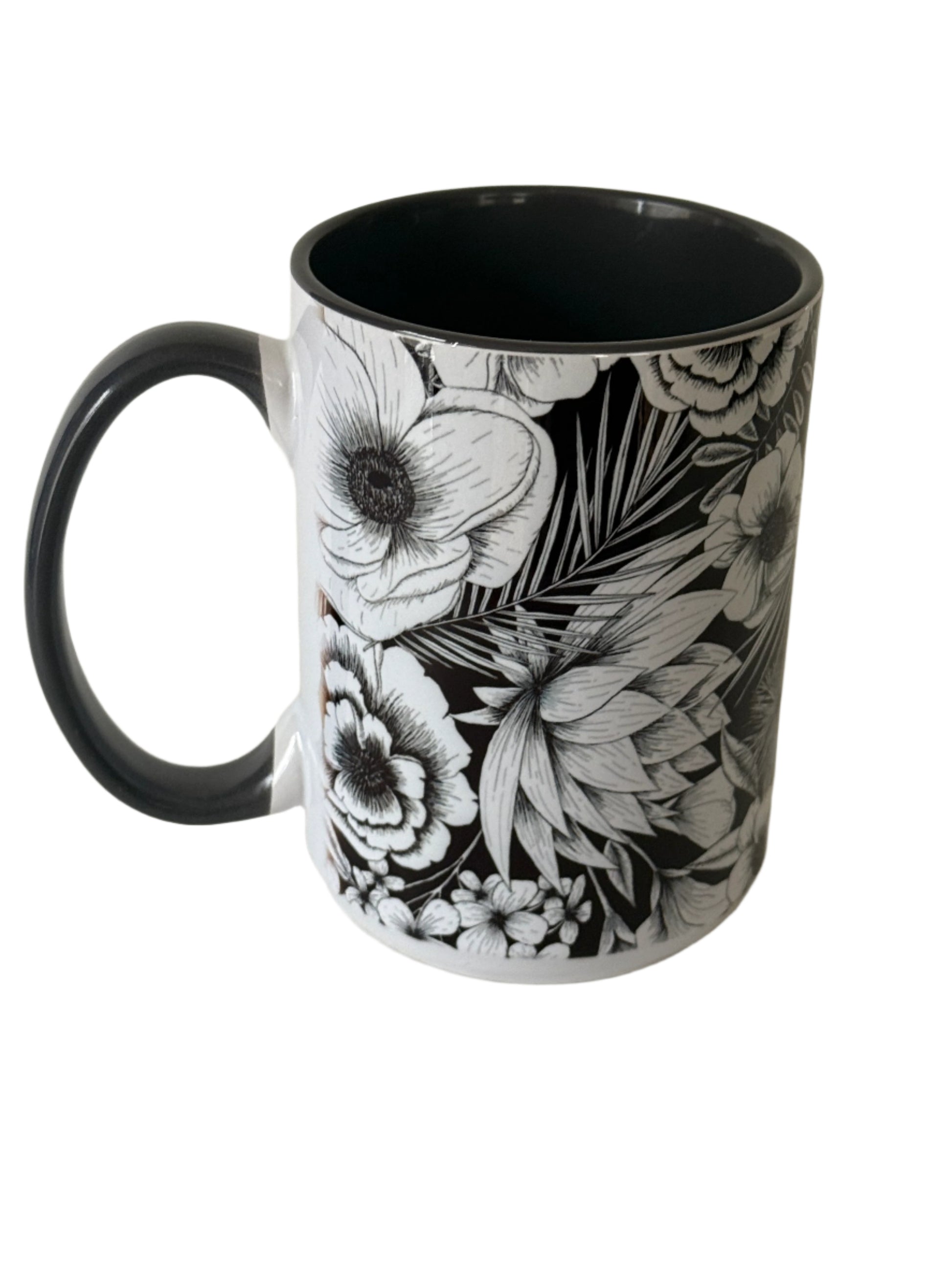 Beautiful 15 oz mug with black and white botanical flower.  Mug has a gray interior and gray handle.