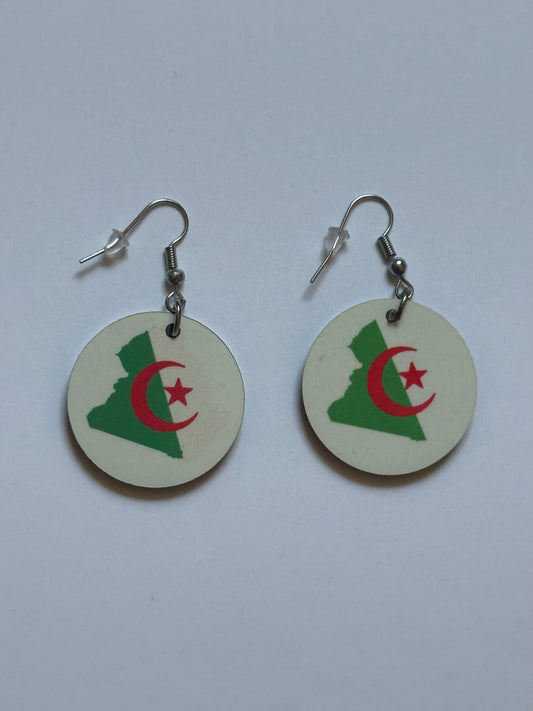 Pair of earrings with an Algerian flag design on a white background. Roxzell