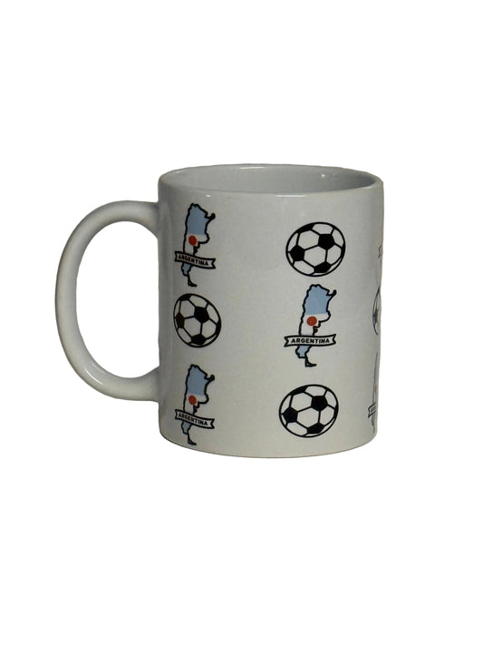 White ceramic mug decorated with black‑and‑white soccer balls and Argentina map on a white background.