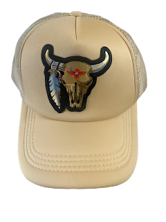 Beige cap with a bull head and feather patch on a white background.