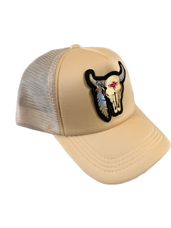 Beige cap with a bull head and feather patch on a white background.