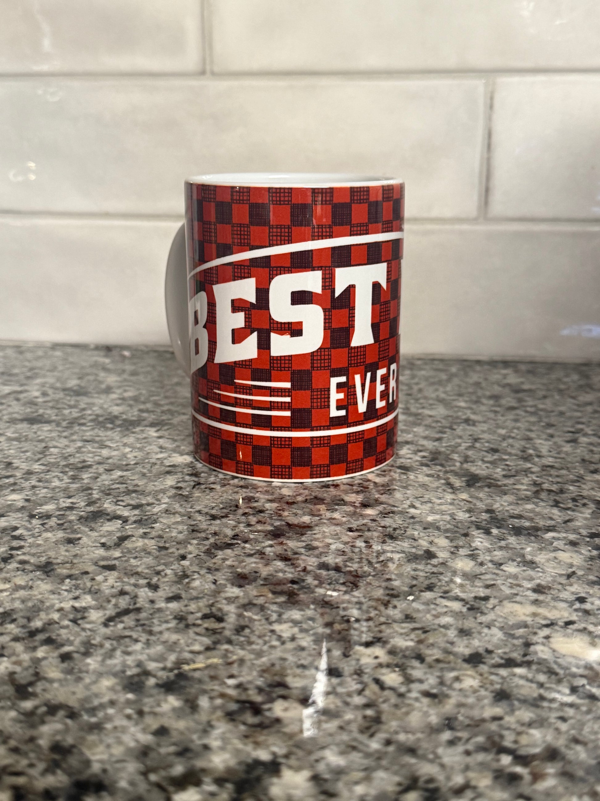 Red and Black checkered coffee mug with 'BEST DAD EVER' design.