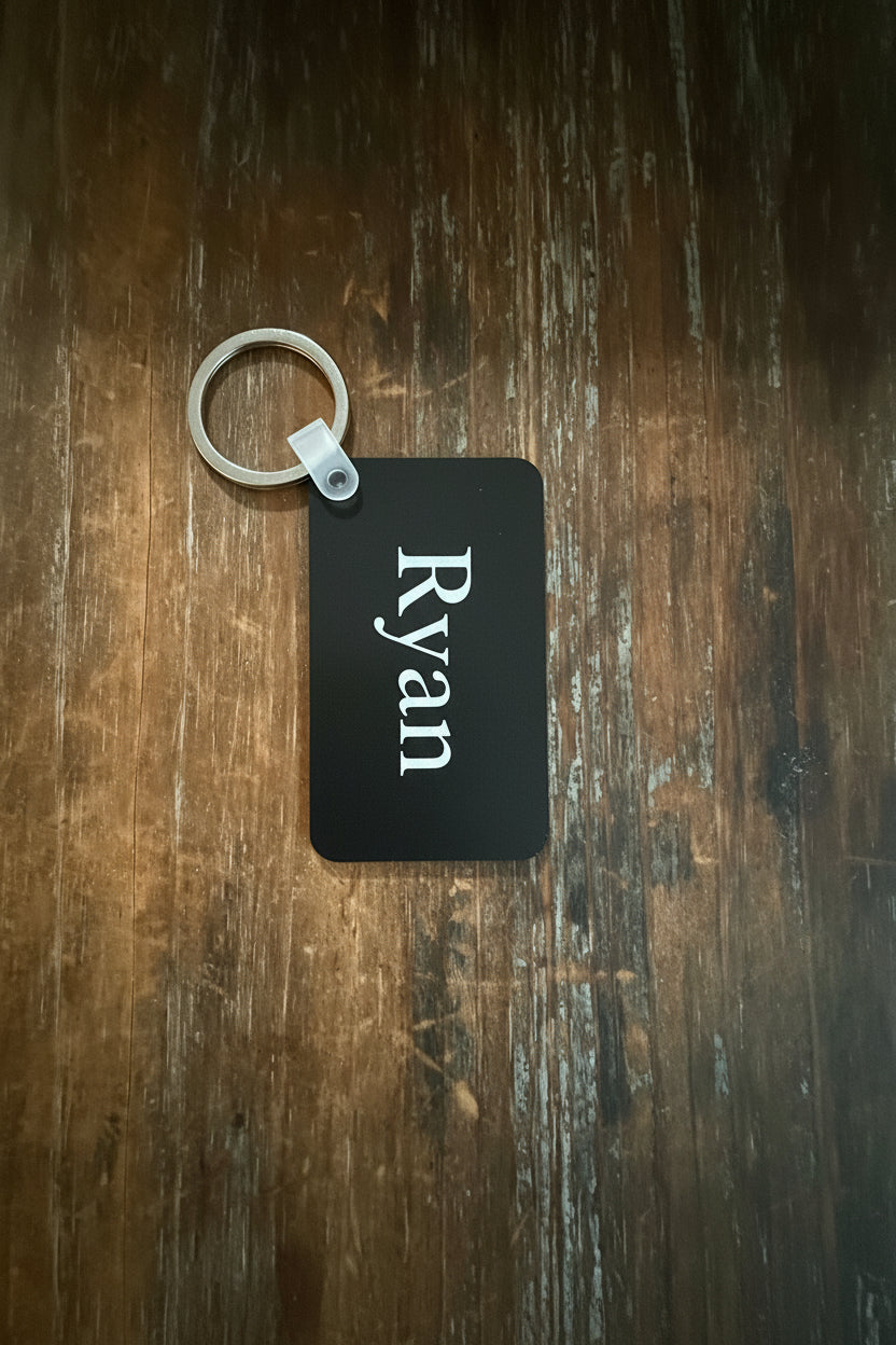 Personalized Ryan keychain with white name print