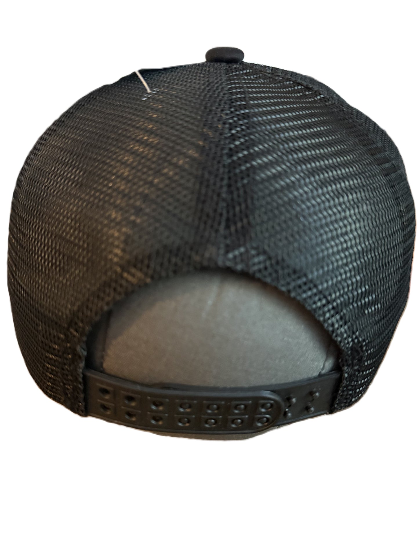 Rear view of a Mickey Mouse trucker hat with a white front panel, black mesh back, and black brim. The front panel features an embroidered Mickey Mouse graphic above the embroidered black script text 'Mickey'. Roxzell