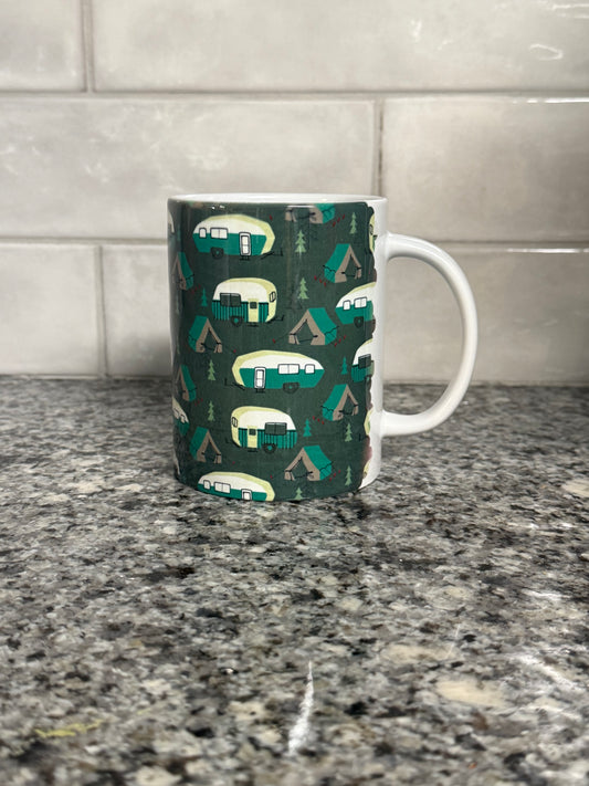 12 oz mug designed with green and white campers, trees, and tents.  Part of our camper series.