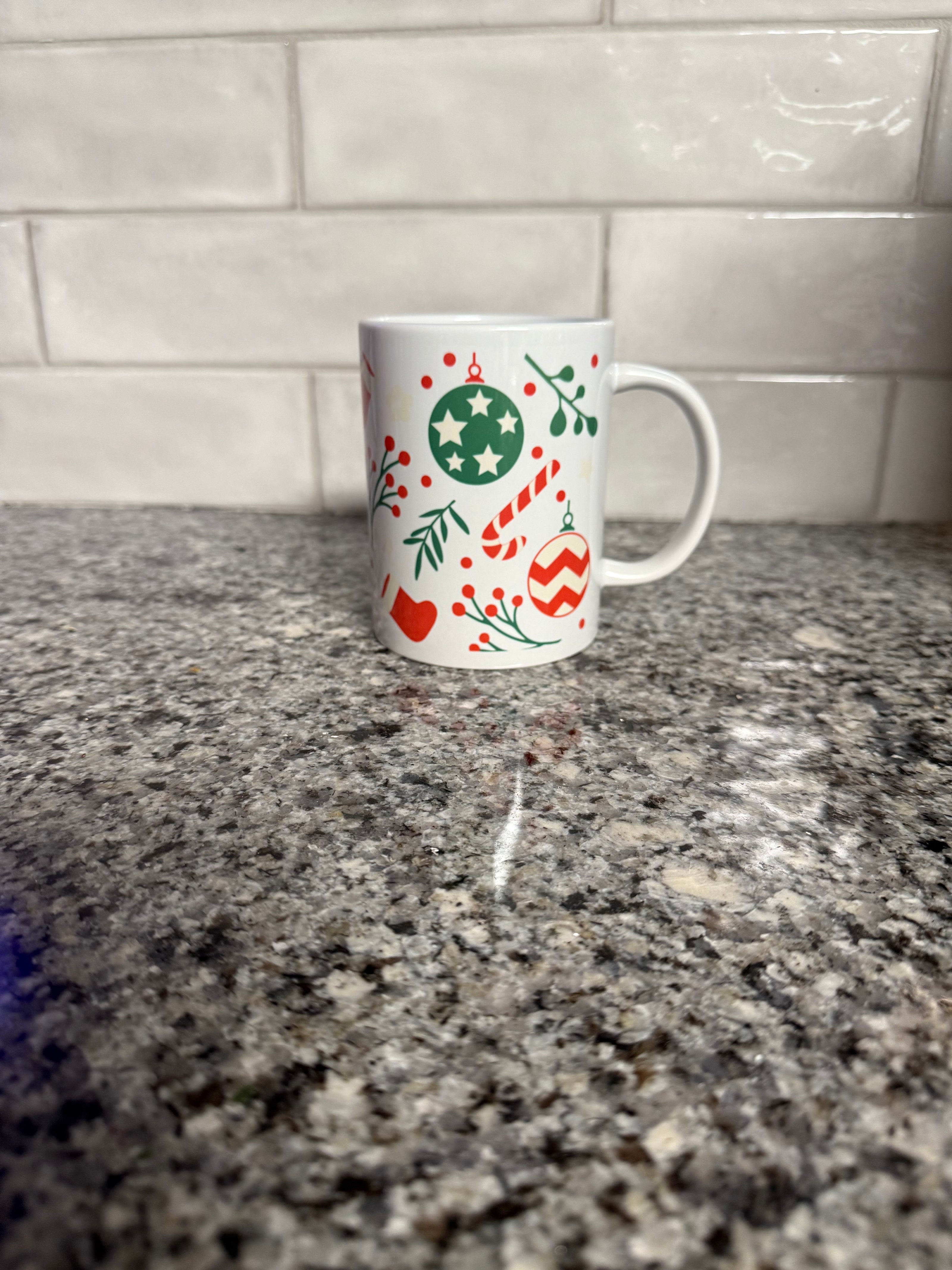 Christmas mug with red and green ornaments, red stockings and candy canes, Roxzell