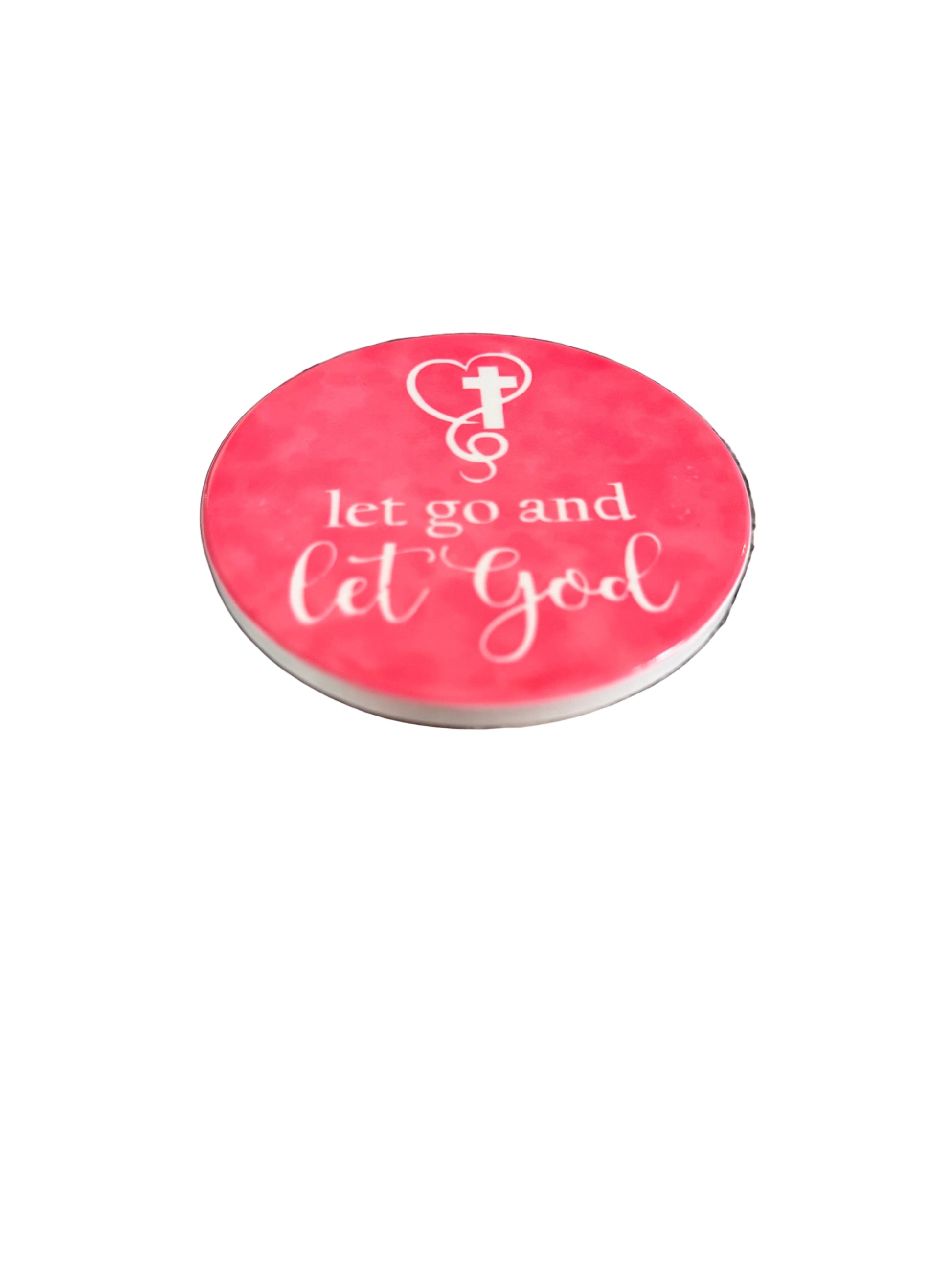 Round bright pink coaster with 'let go and let God' text and cross surrounded by a heart Roxzell
