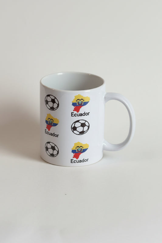 White ceramic mug with Ecuador map and soccer ball graphics, ideal for fans of Ecuadorian soccer.
