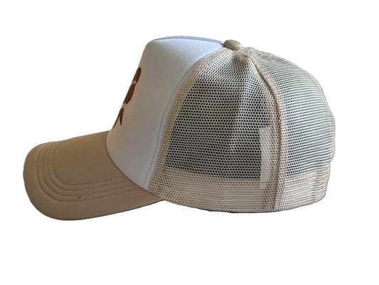 Left side view showing beige mesh and curved brim of the football bow trucker hat. Roxzell