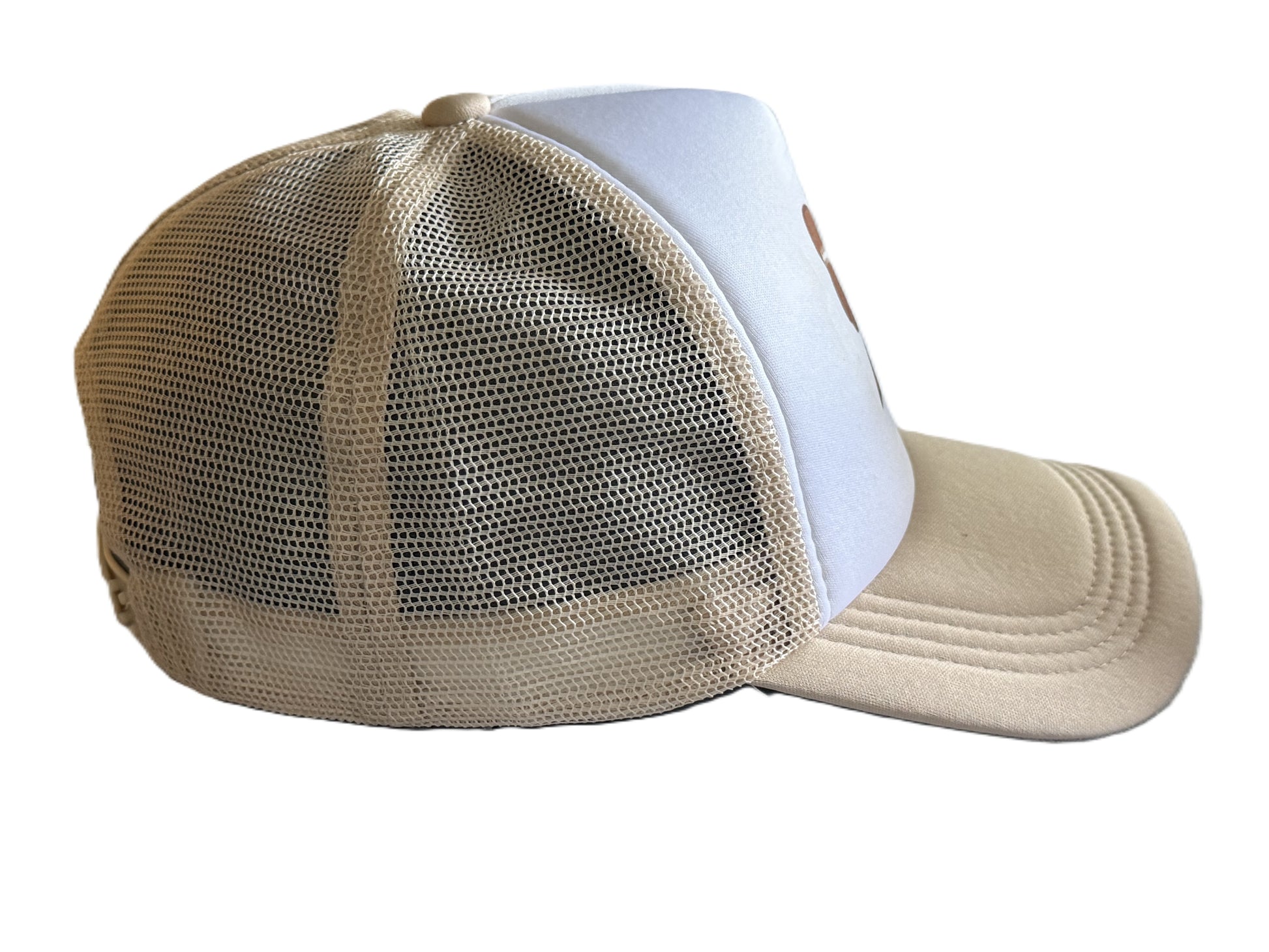 Right side view showing beige mesh and curved brim of the football bow trucker hat. Roxzell