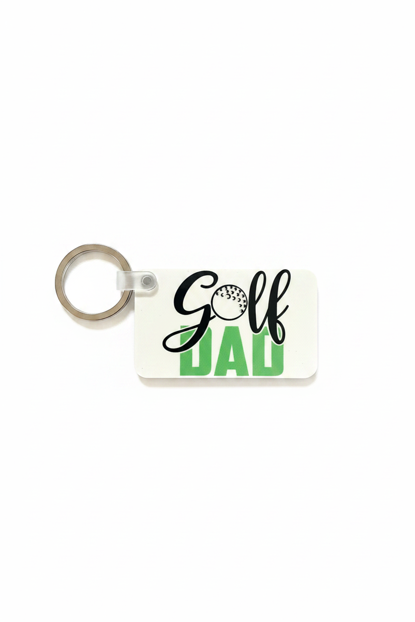 Green rectangular keychain with white text “Golf”  and green text "DAD" on a white background. Roxzell