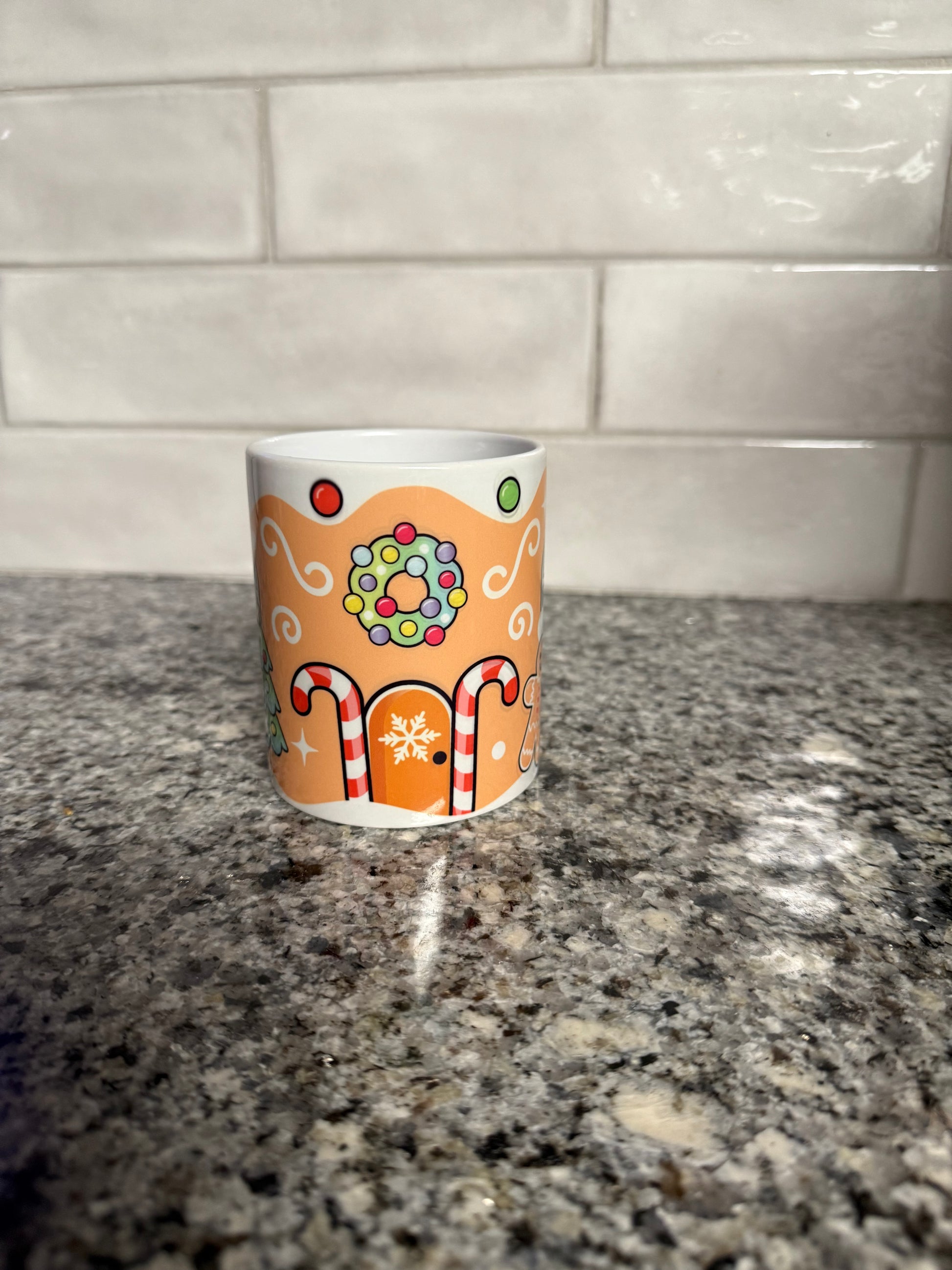 Holiday gingerbread ceramic mug with candy cane and snowflake design on countertop, Roxzell