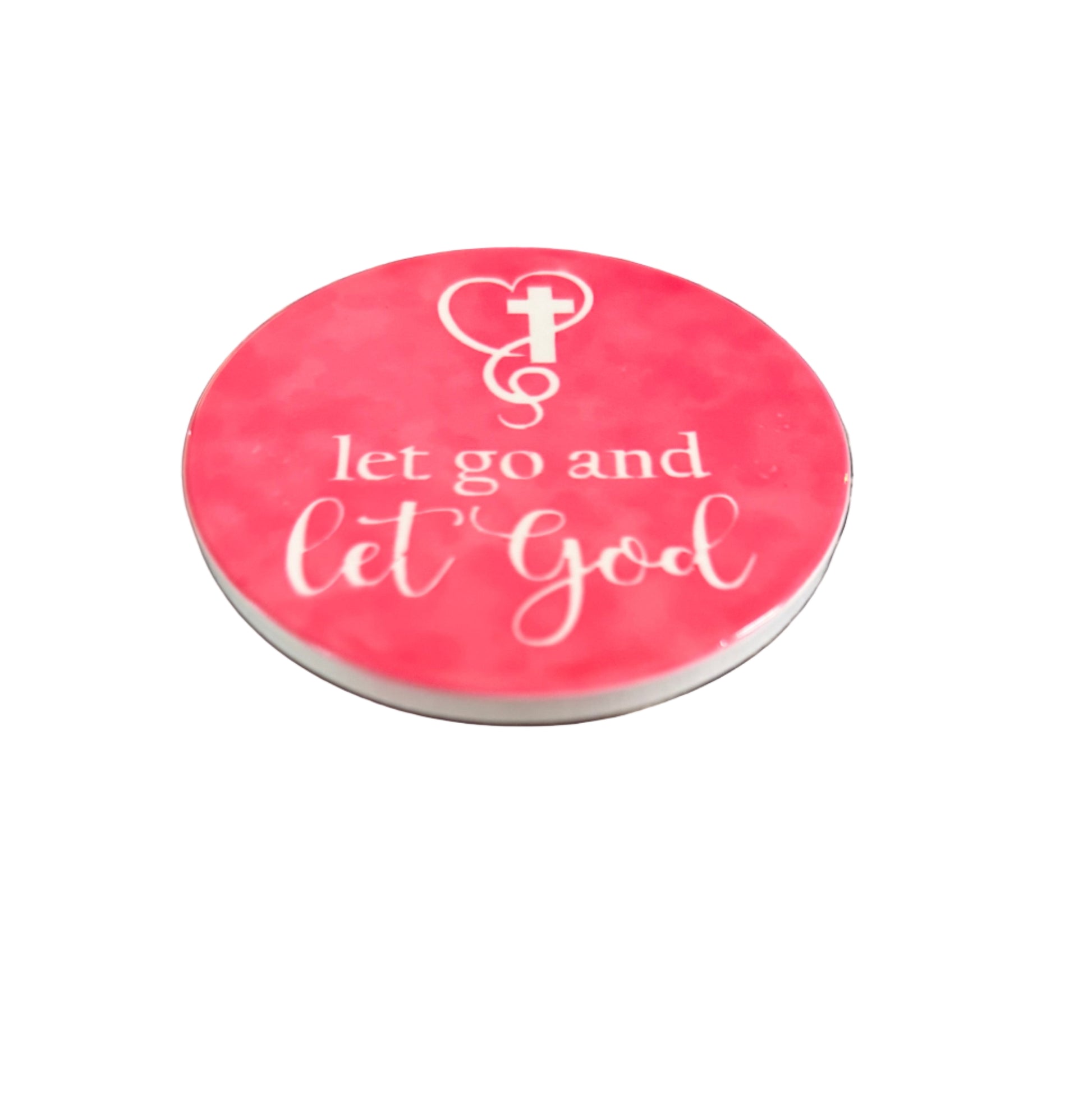 Round bright pink coaster with 'let go and let God' text and cross surrounded by a heart Roxzell