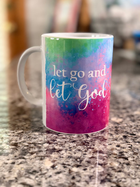 Green, Blue, and Pink "Let Go and Let God" coffee mug left side, Roxzell