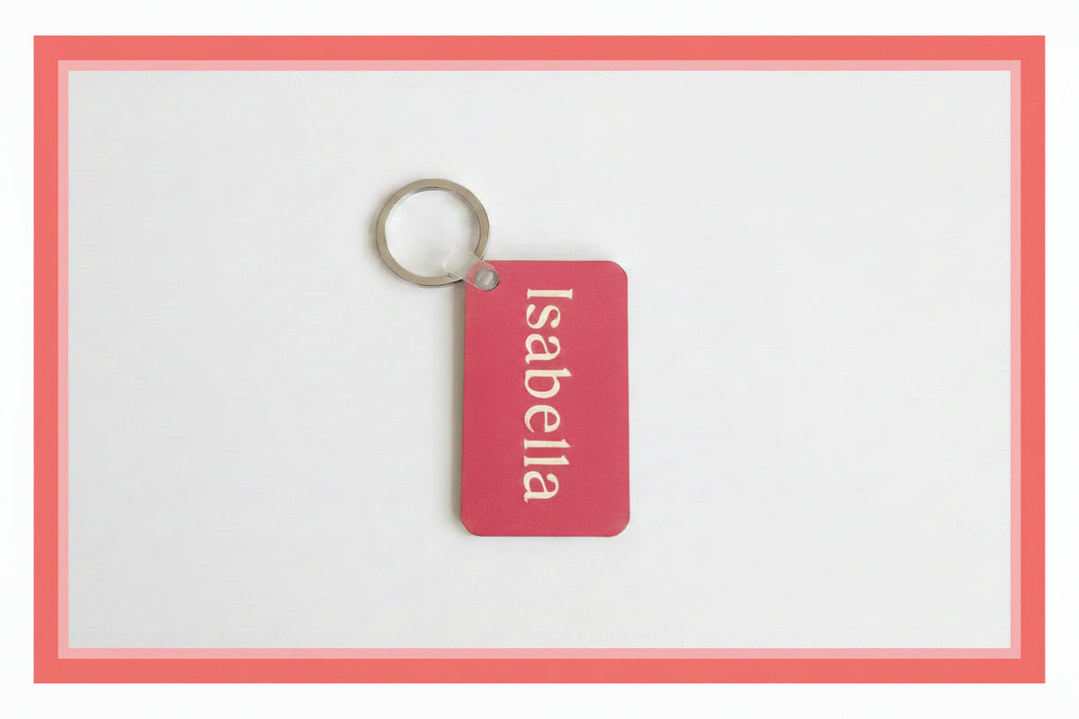 Personalized Isabella keychain with white name print