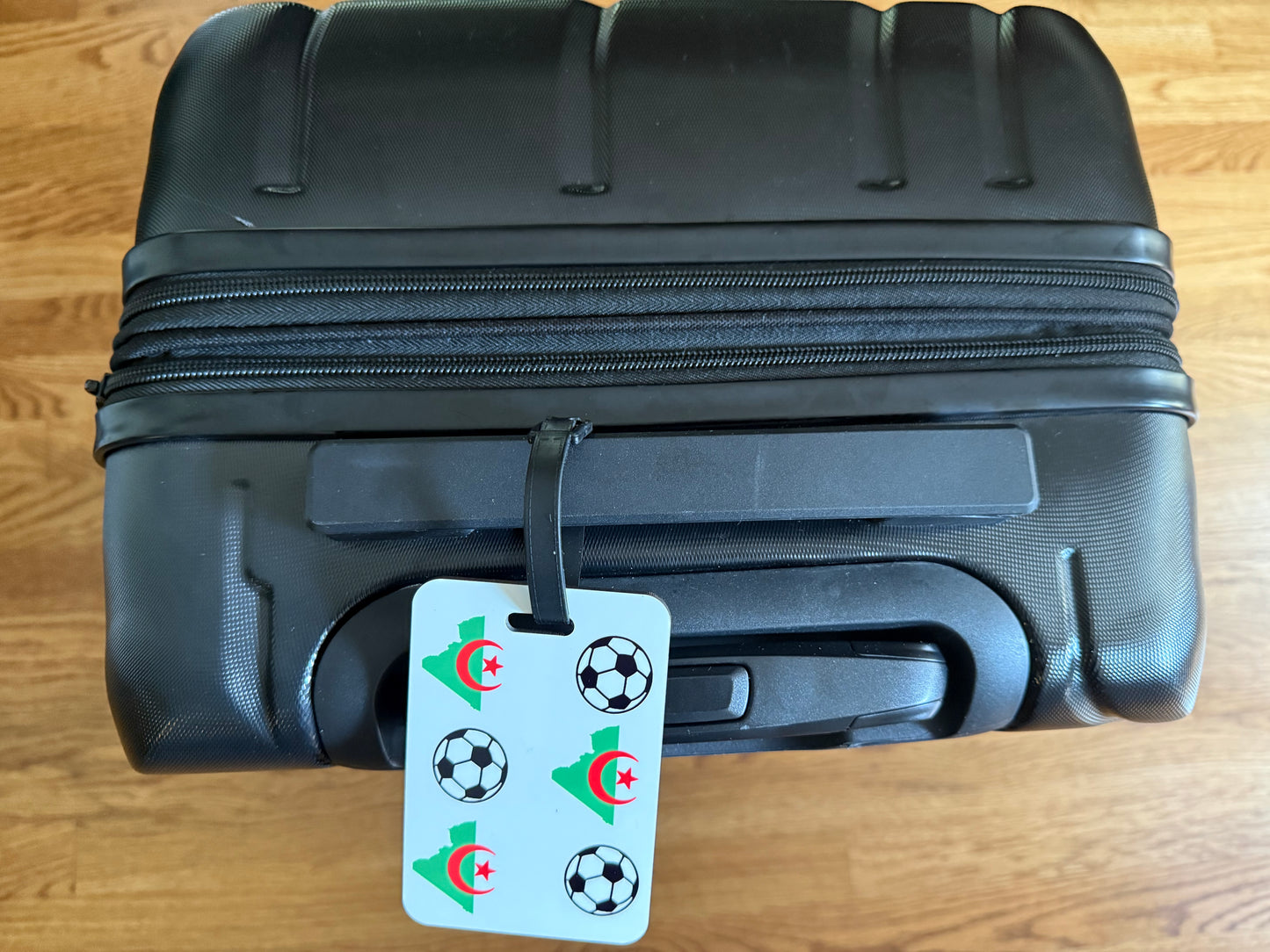 Algerian flag inspired travel tag with football pattern. Roxzell