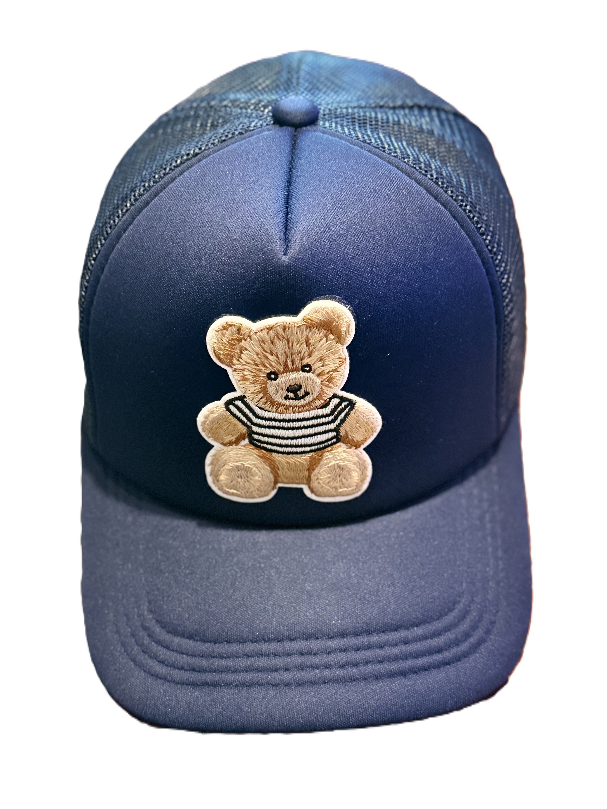 Navy mesh trucker hat with a cute teddy bear patch in a striped shirt centered on the front.