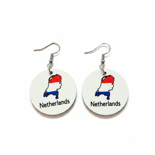 Two circular earrings with the Netherlands map and flag colors, shown against a clean white backdrop for product display.