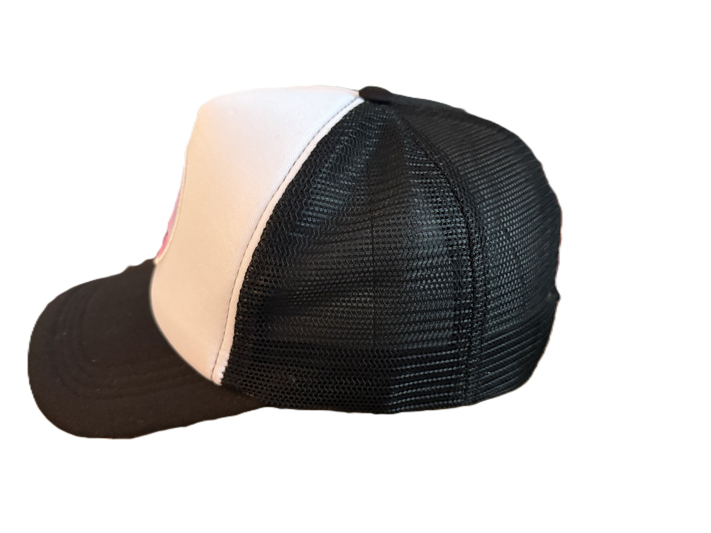Left side view of a black mesh Smiley Face trucker hat showing adjustable snap closure and breathable material. Roxzell
