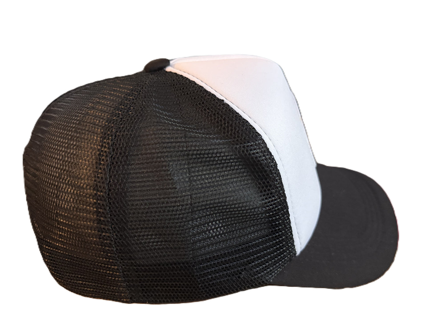 Right side view of a black mesh Smiley Face trucker hat showing adjustable snap closure and breathable material. Roxzell