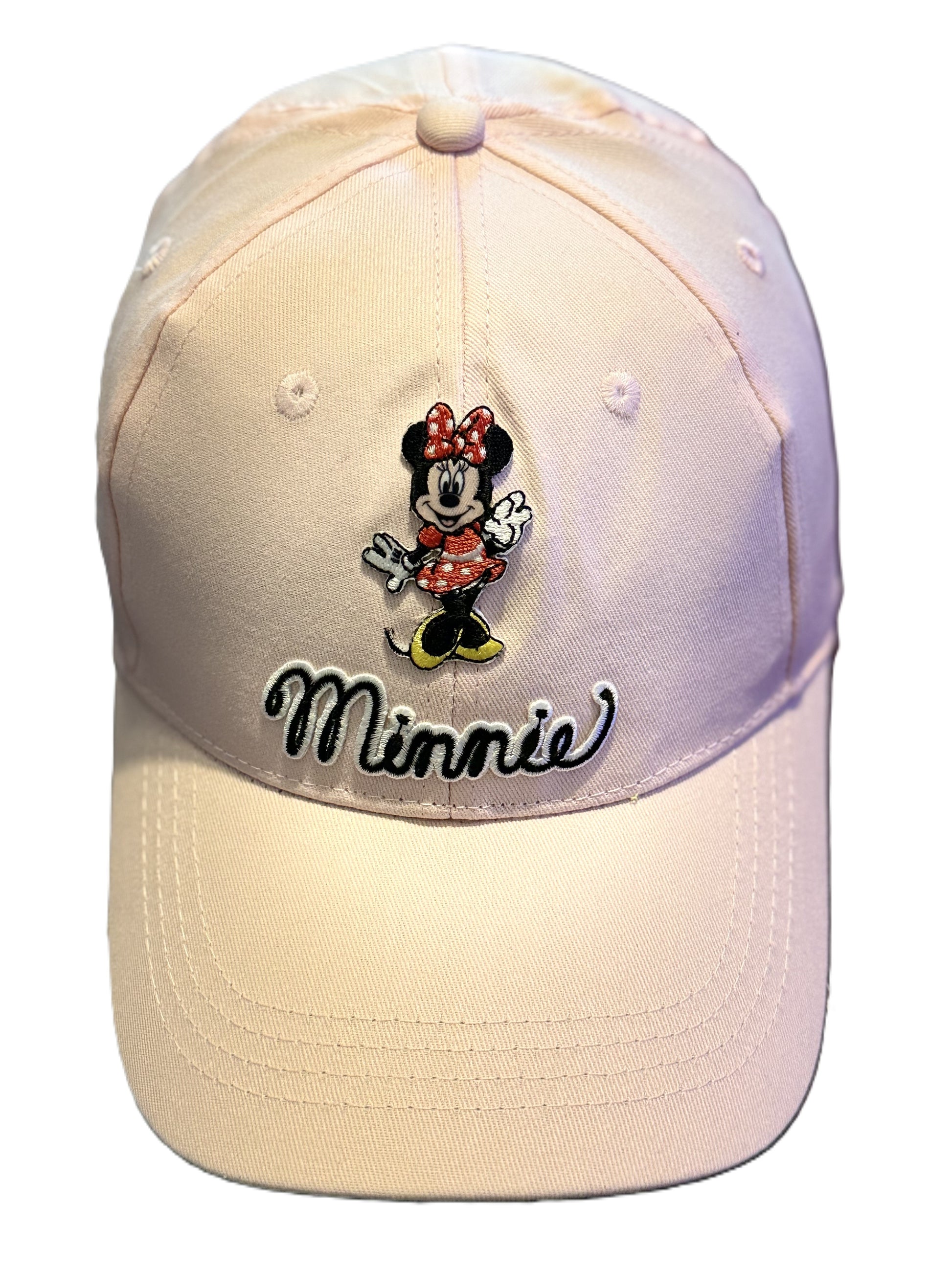 Detailed front view of a pink baseball cap showing Minnie Mouse embroidery and “Minnie” text in black and white thread.