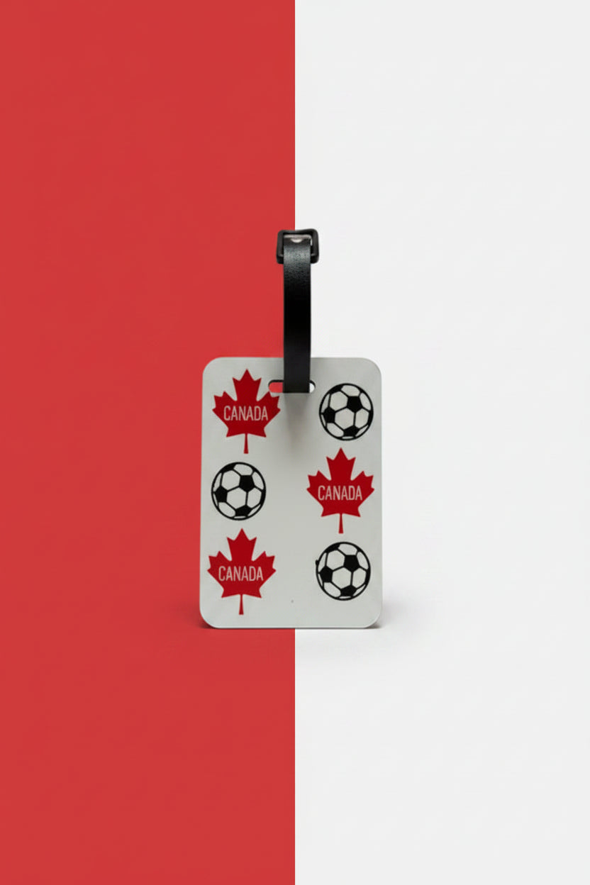 Maple leaf and soccer ball design printed on durable tag on a red and white background. Roxzell