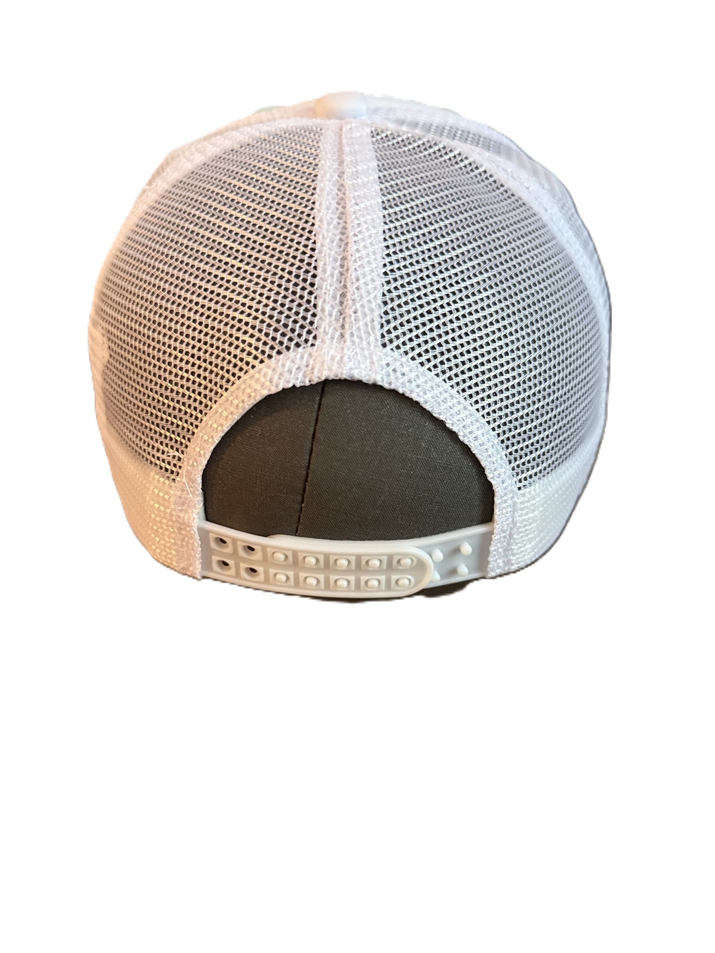 Back view of a white mesh soccer ball pattern trucker hat showing the adjustable snap closure and breathable mesh design.