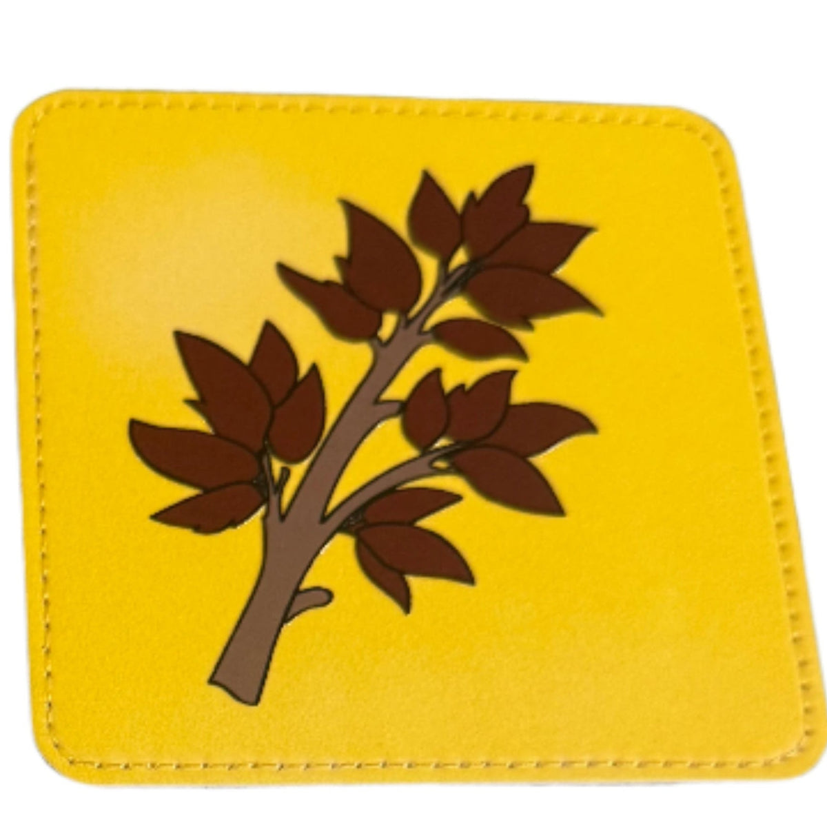 A square yellow drink coaster with rounded corners, featuring a brown branch and leaf graphic in the center, shown on a white background. Roxzell