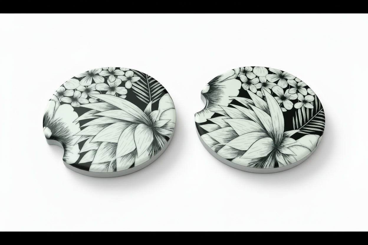 Two black and white floral car coasters on a white background with black border, Roxzell