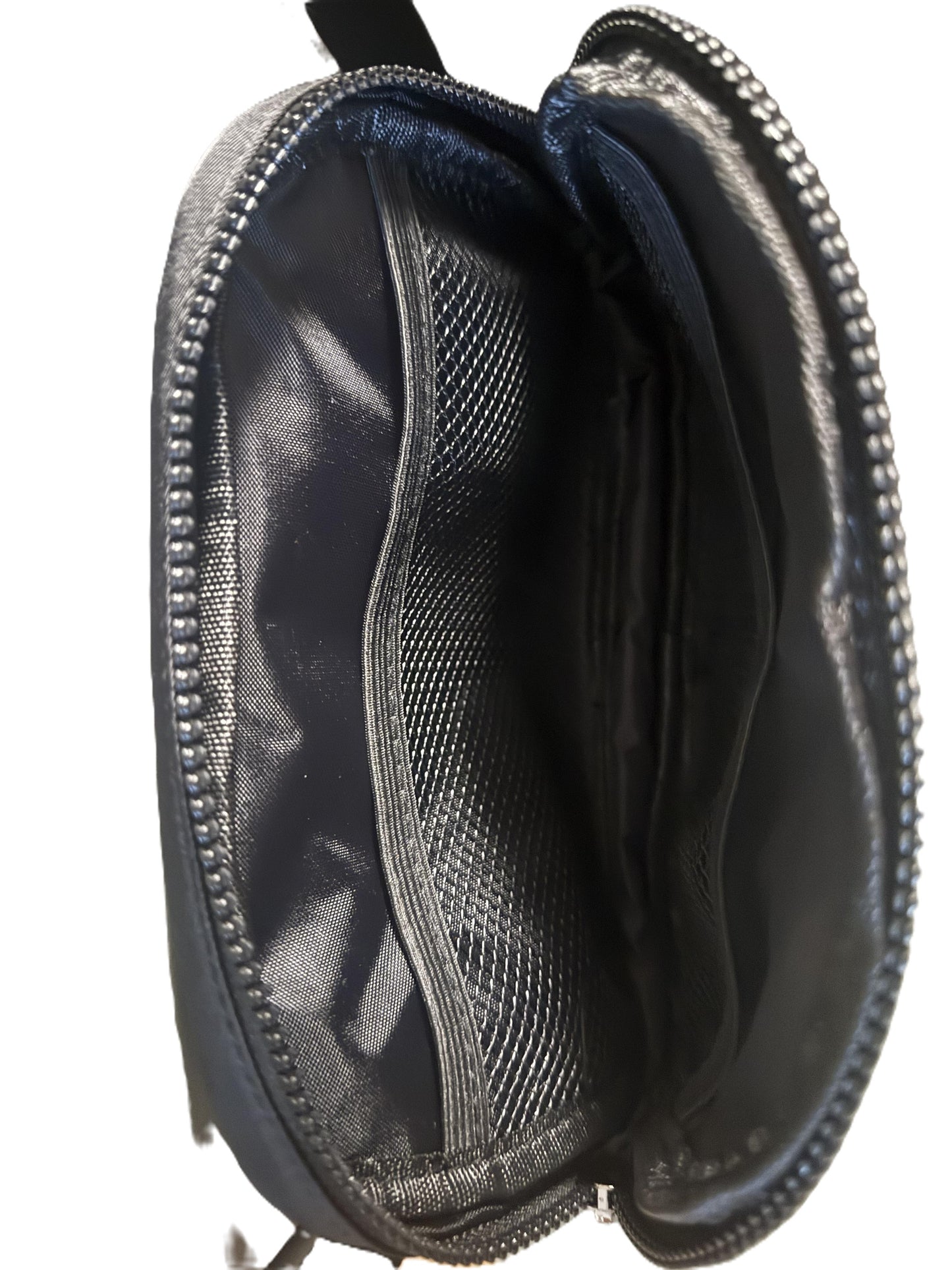 Open black organizer pouch showing multiple mesh pockets and compartments designed for holding small items. Roxzell