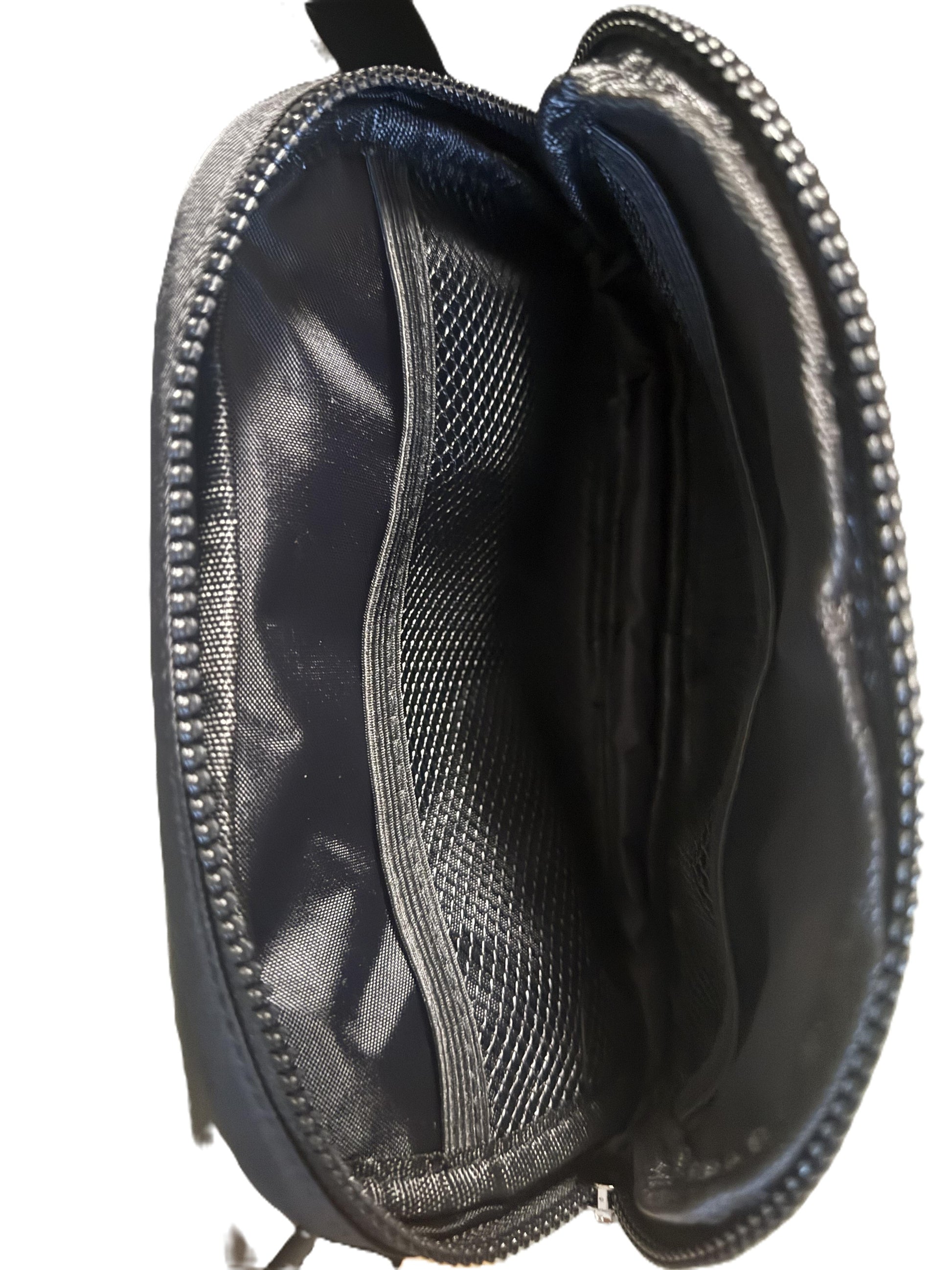 Open black organizer pouch showing multiple mesh pockets and compartments designed for holding small items. Roxzell