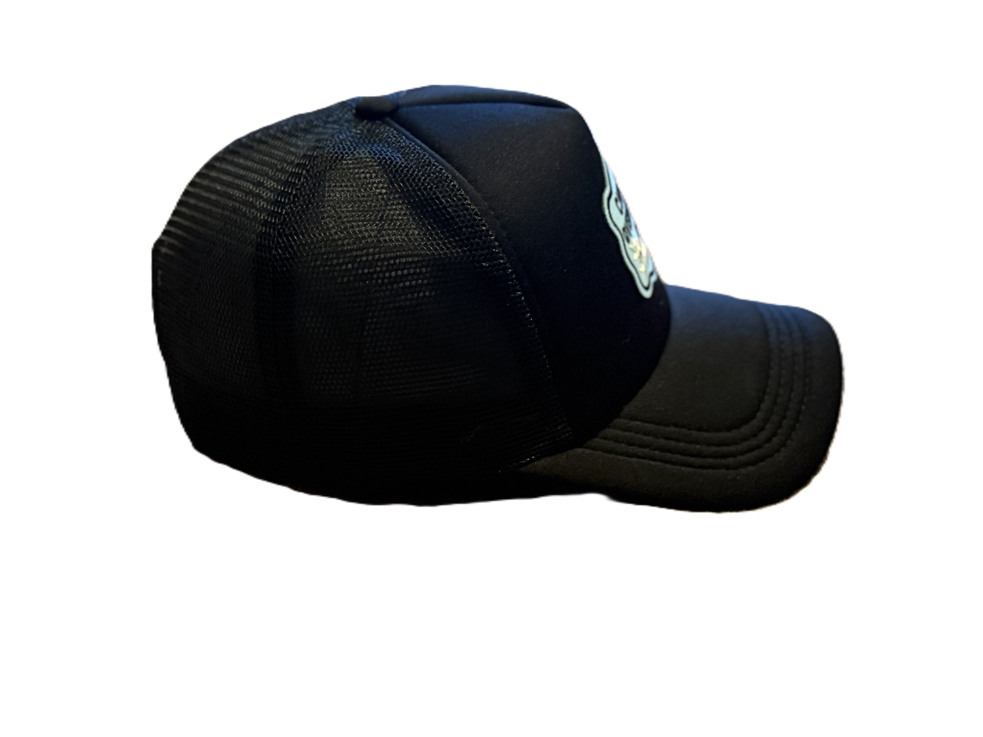 Right side view of black trucker hat with “Chronic Overthinkers Club” embroidered patch. Roxzell