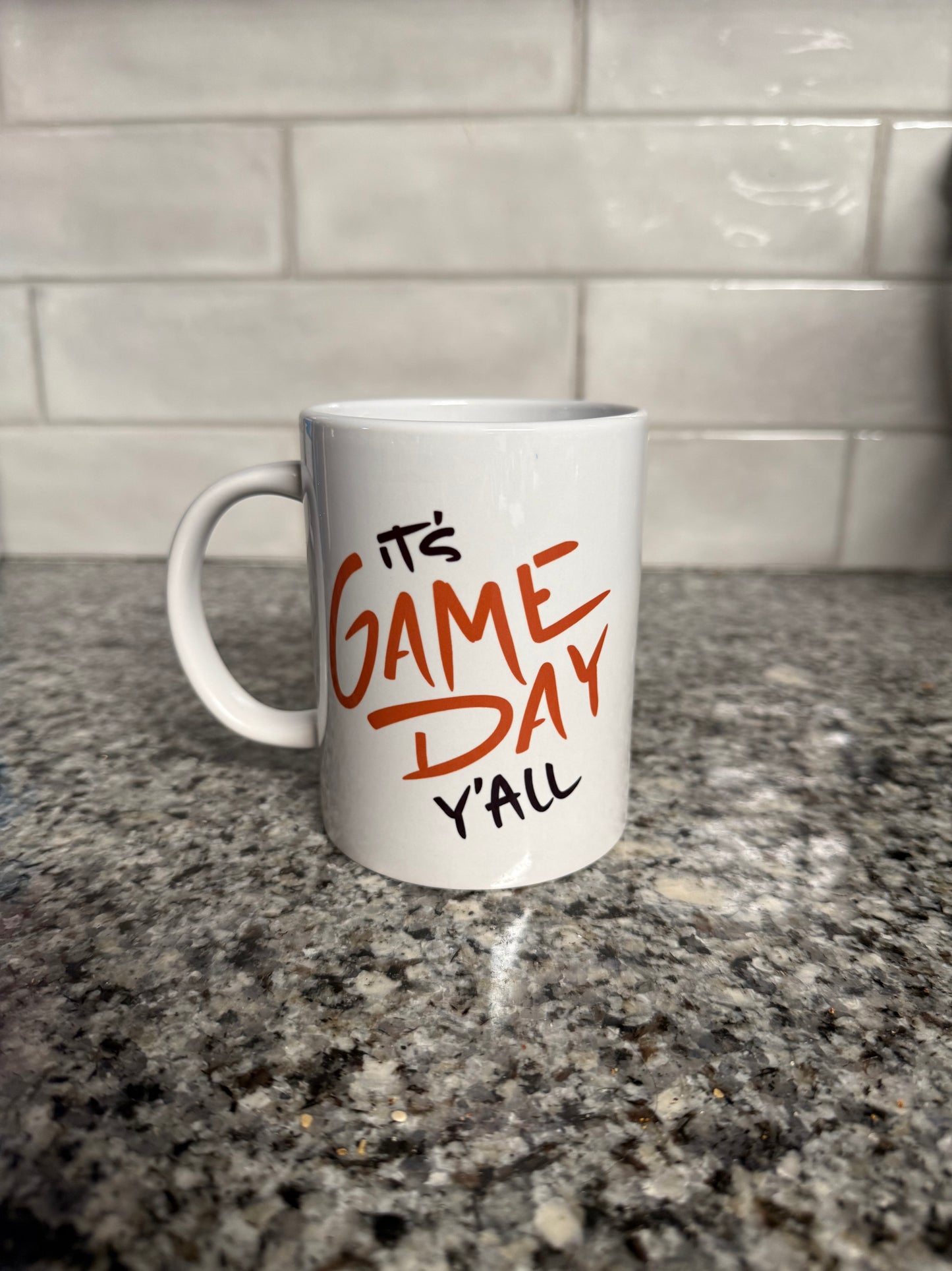 Double-sided football mug showing bold game day and touchdown designs