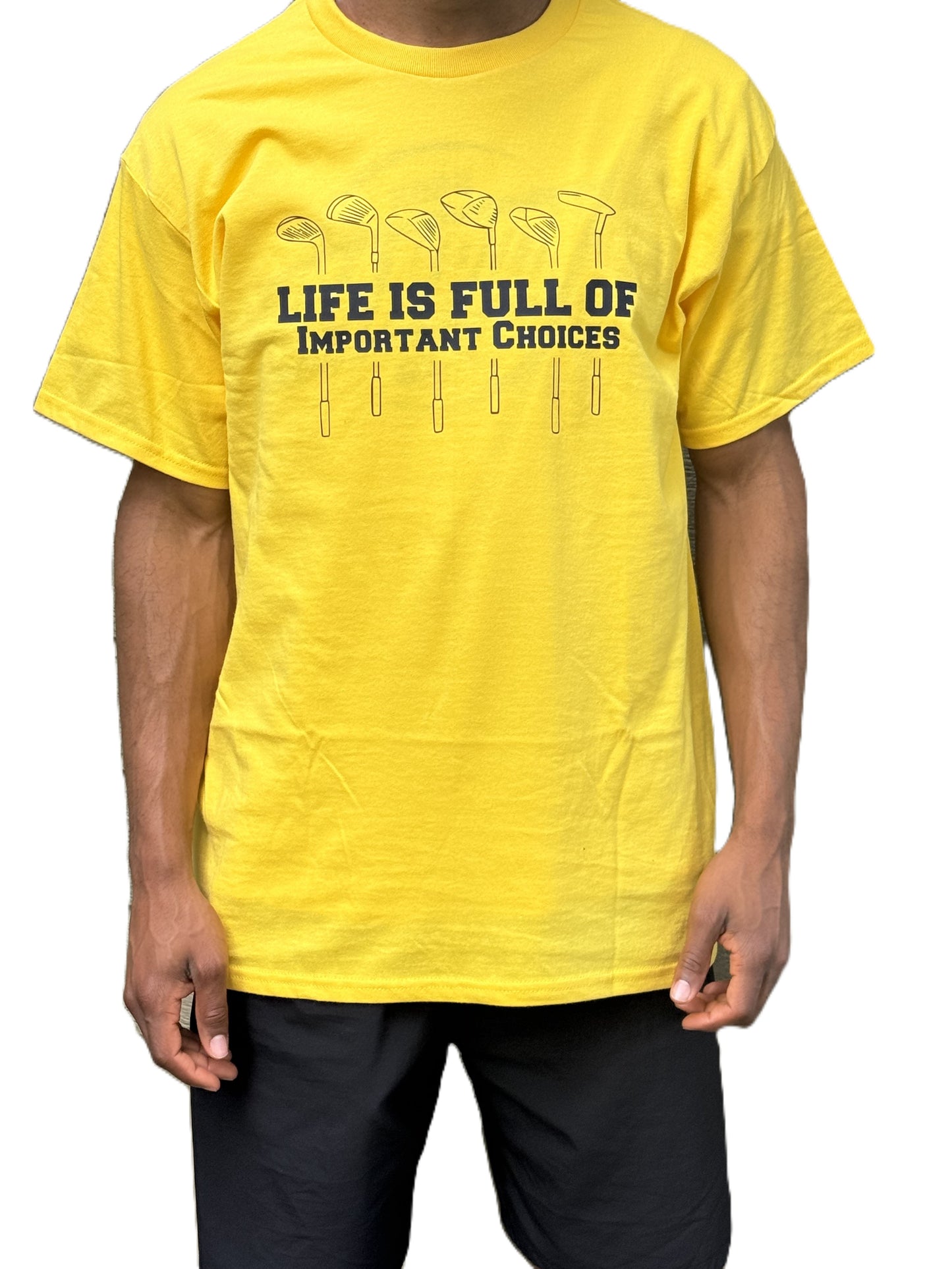 Man wearing yellow t-shirt with 7 golf glubs and Life Is Full of Important Choices graphic.