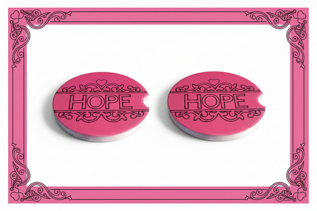 Two pink 'HOPE' car coasters with decorative pink border. Roxzell