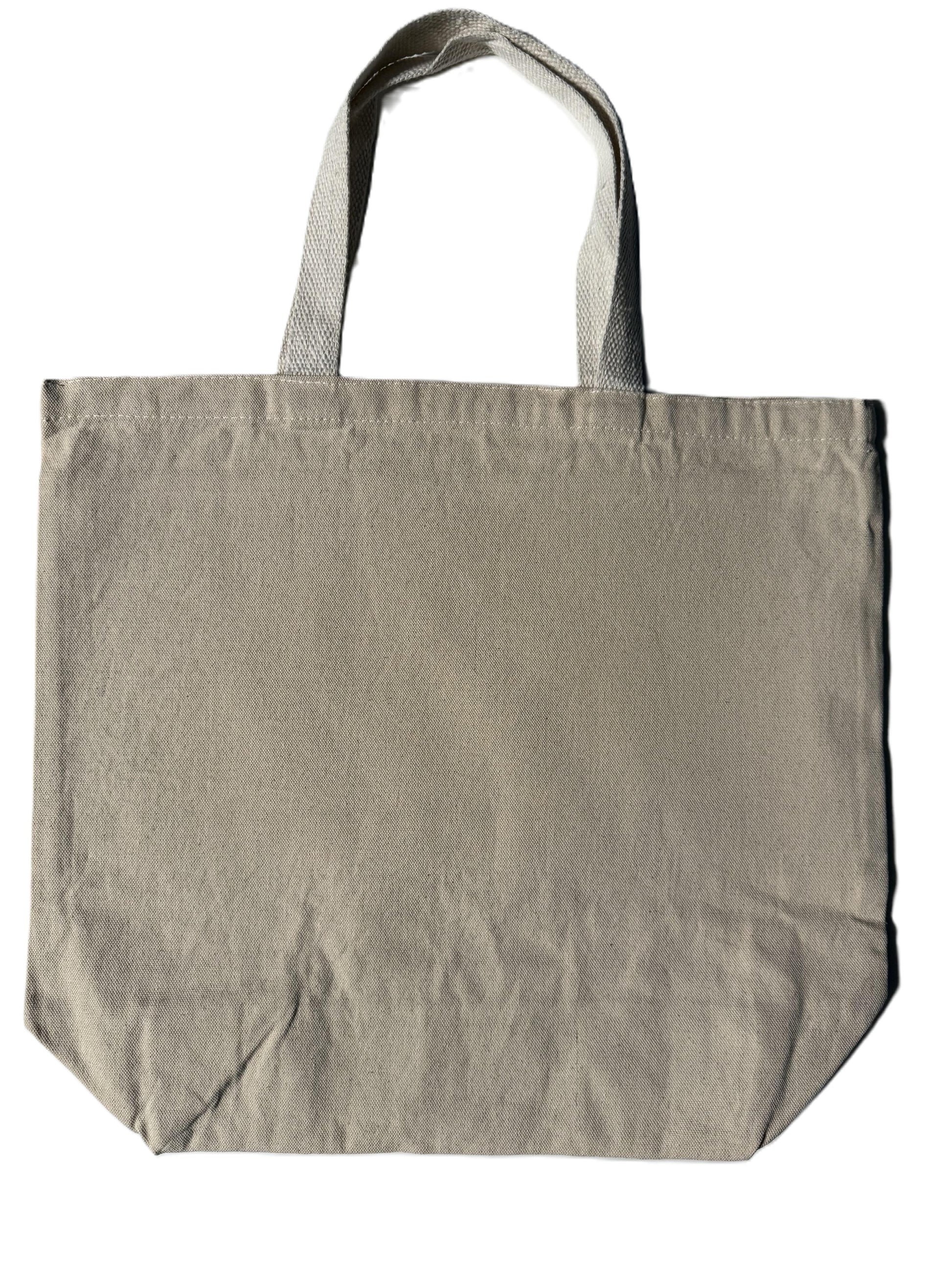 Reverse side of KC tote bag with blue collegiate lettering, Roxzell