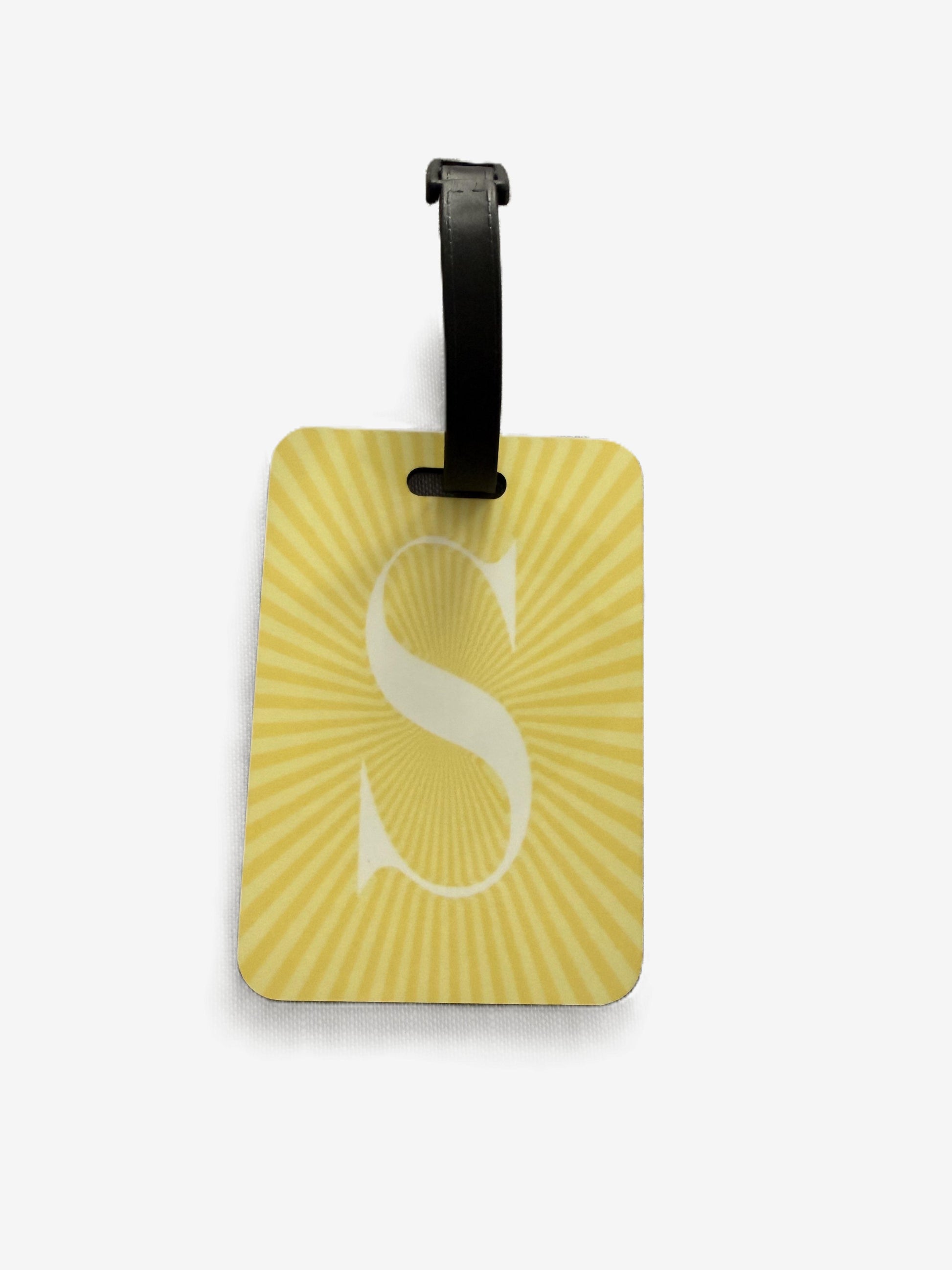 Yellow luggage tag with a black strap and letter 'S' on a white background, Roxzell